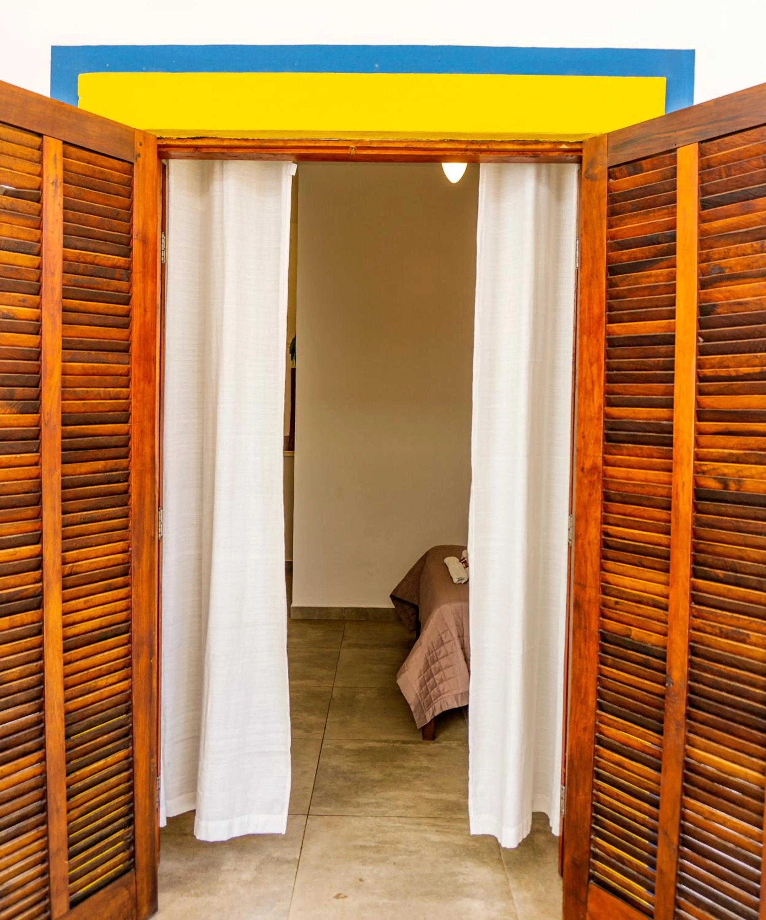 Bed in Pousada Casarão