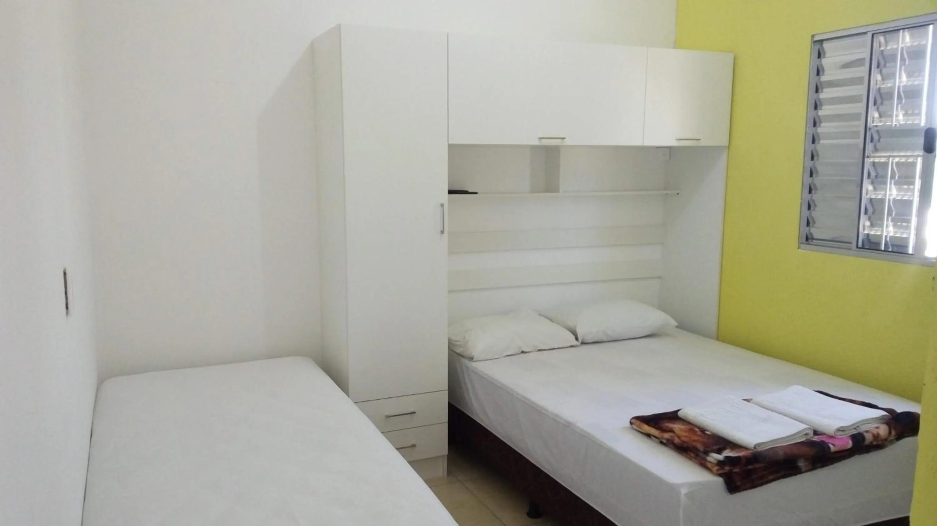 Bed in Pousada Lirio dos Vales