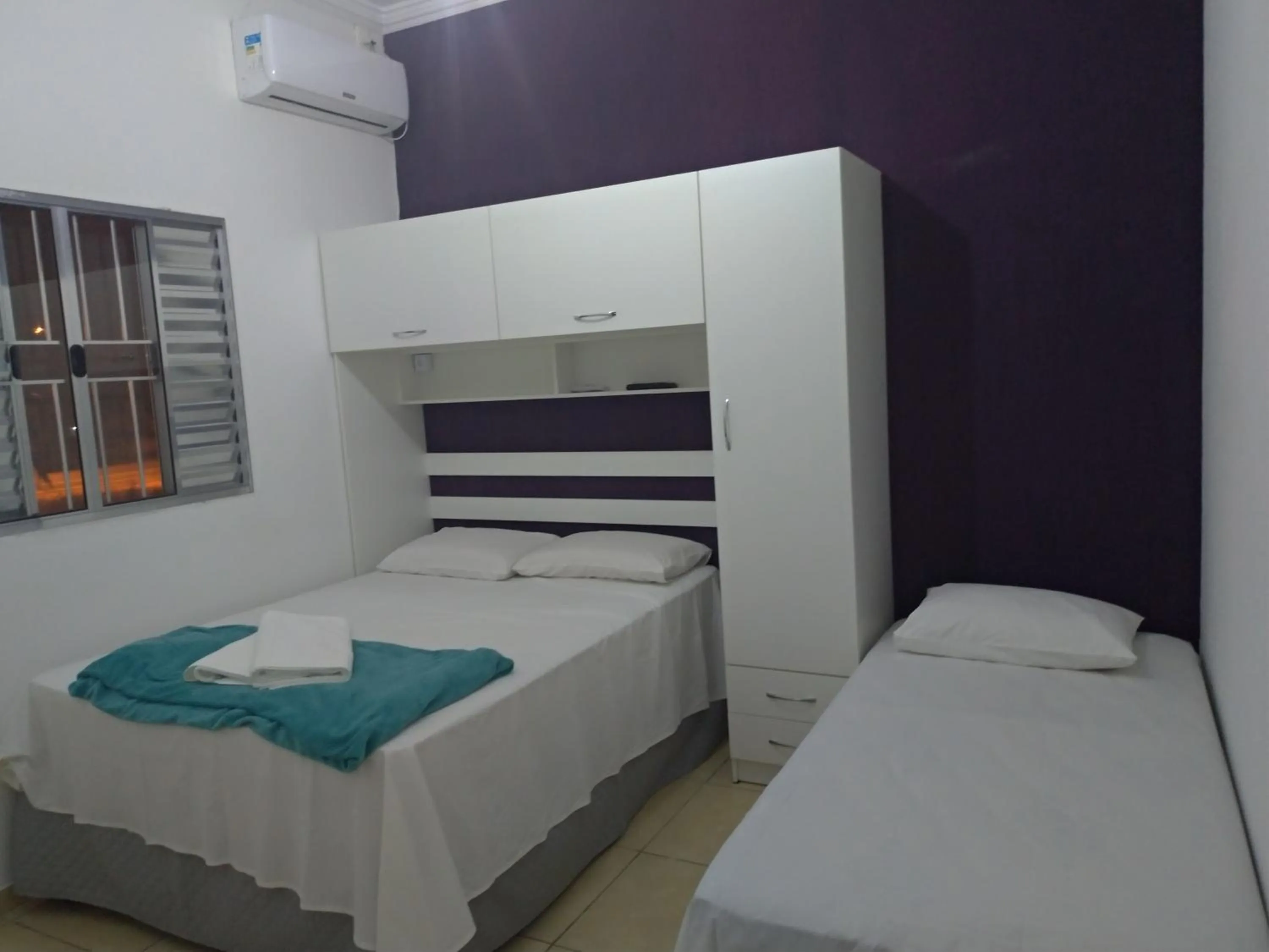 Bed in Pousada Lirio dos Vales