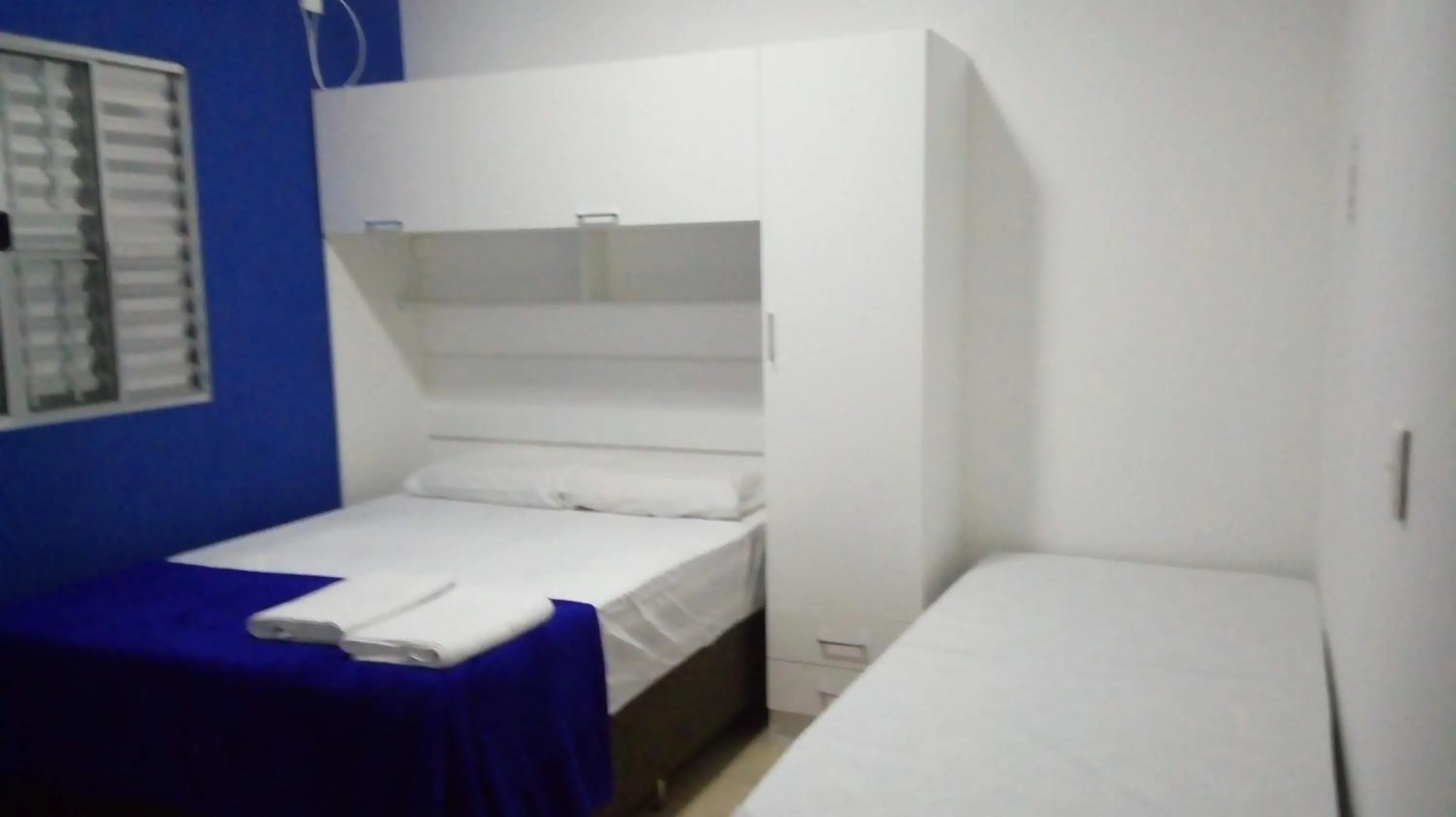 Bed in Pousada Lirio dos Vales