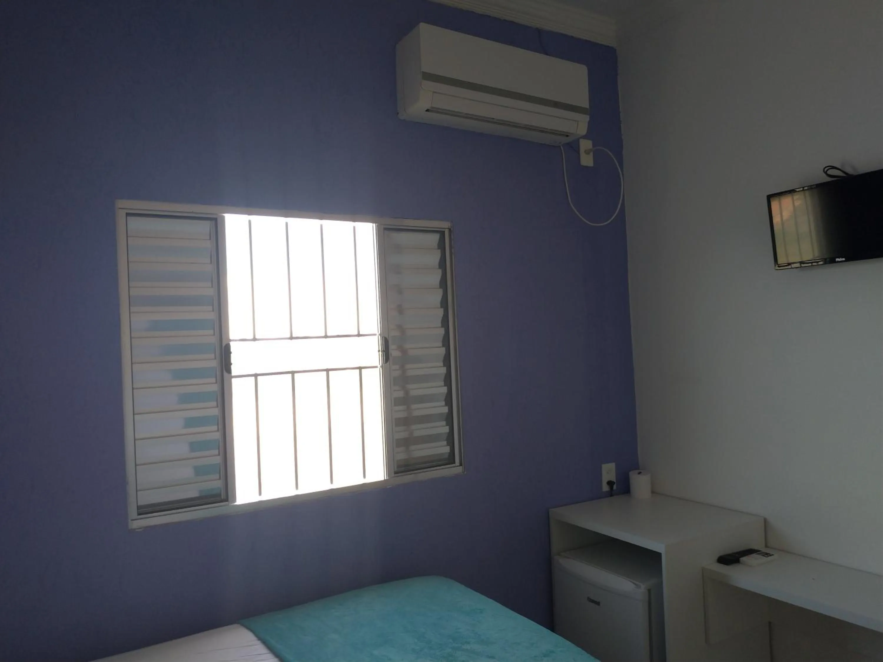 Bed in Pousada Lirio dos Vales