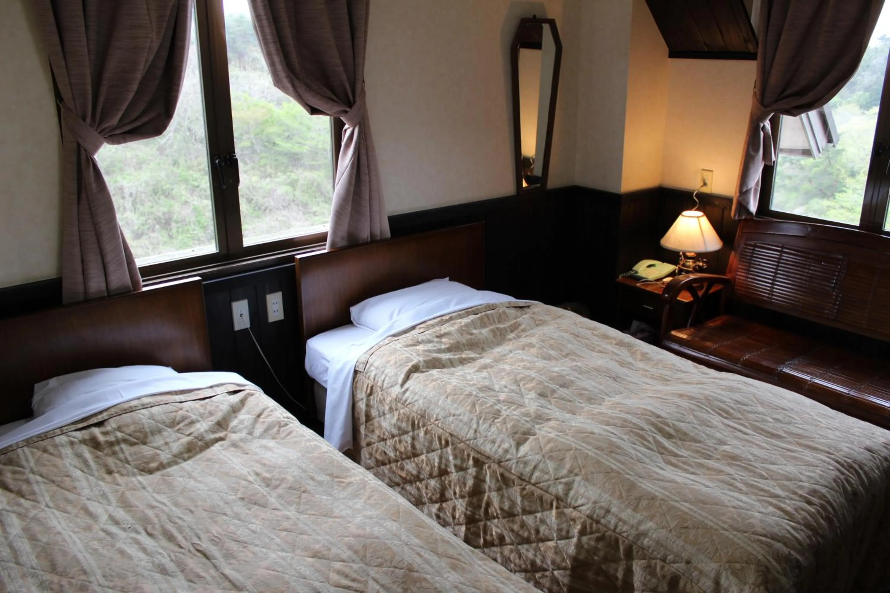 Bed in Matsushima Petit Hotel Bistro Abalon