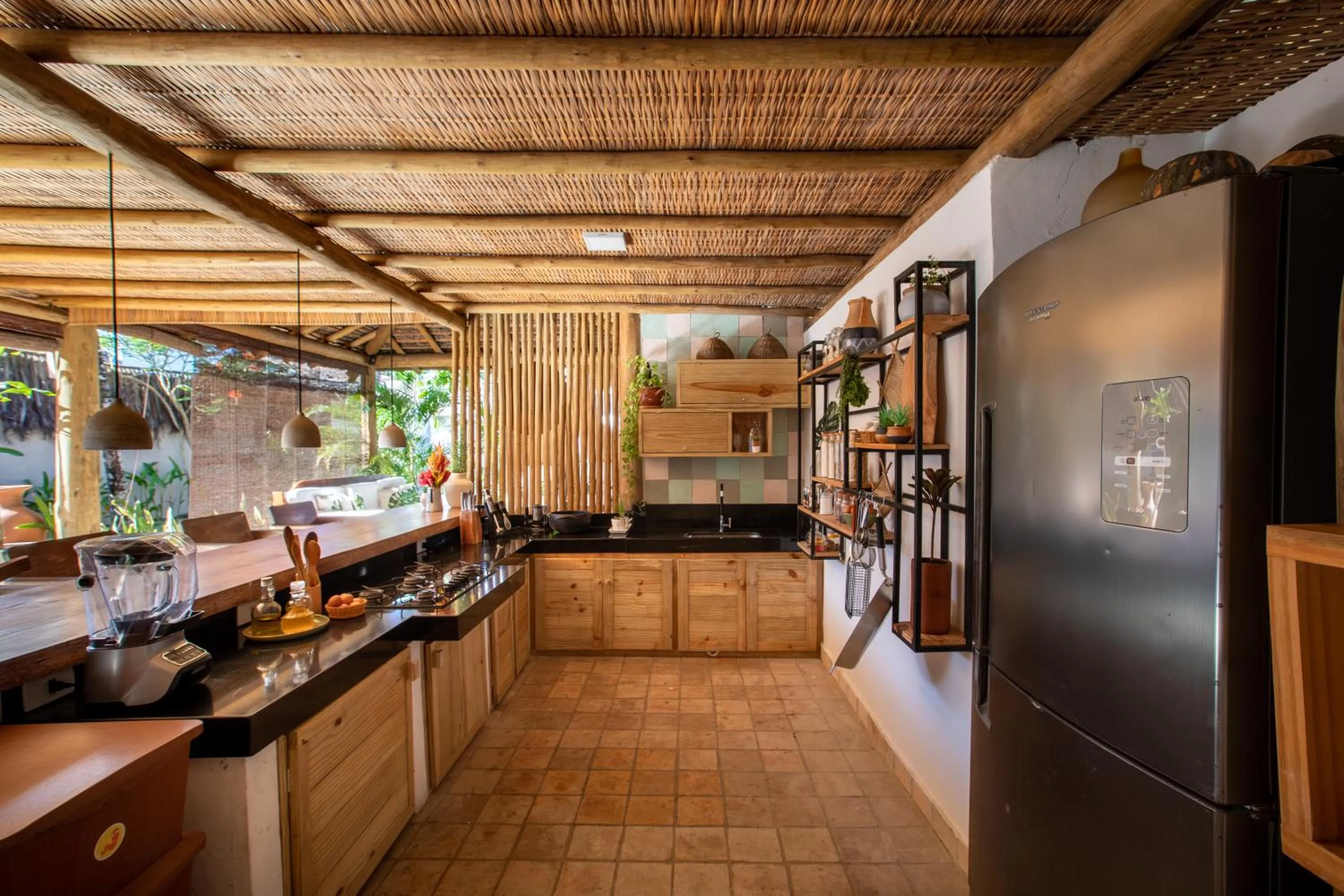 Kitchen or kitchenette in Casa e Pousada Alecrim
