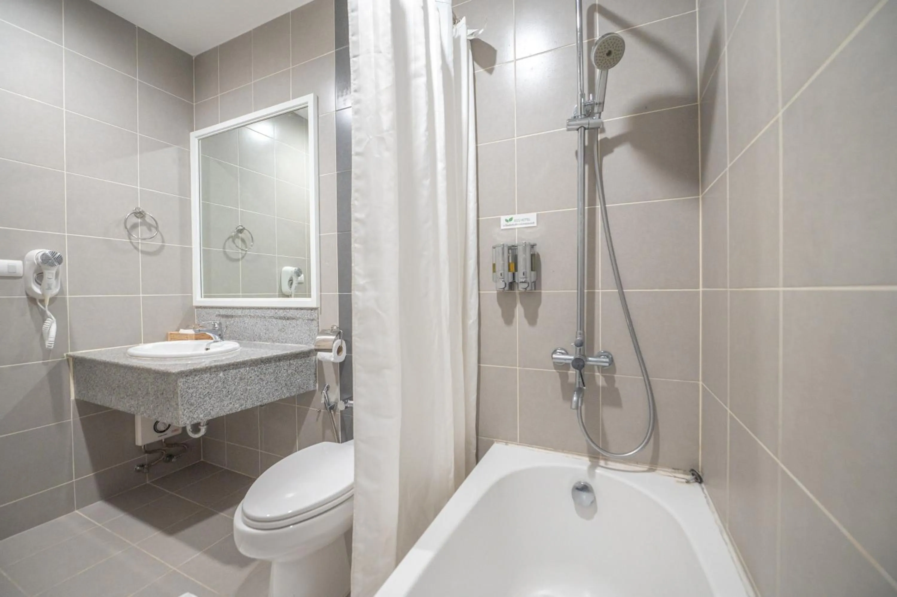 Shower in Eco Hotel by Thammasat