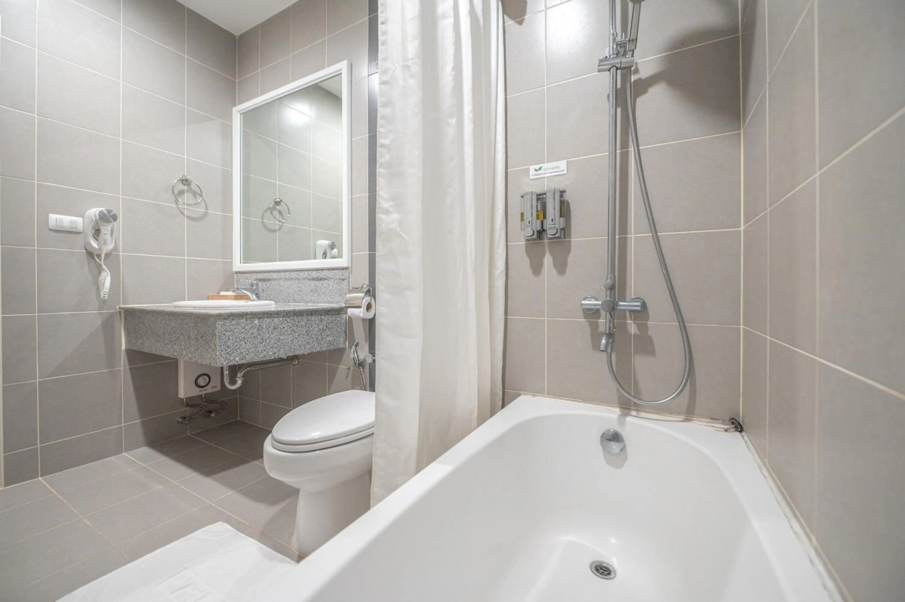 Shower in Eco Hotel by Thammasat