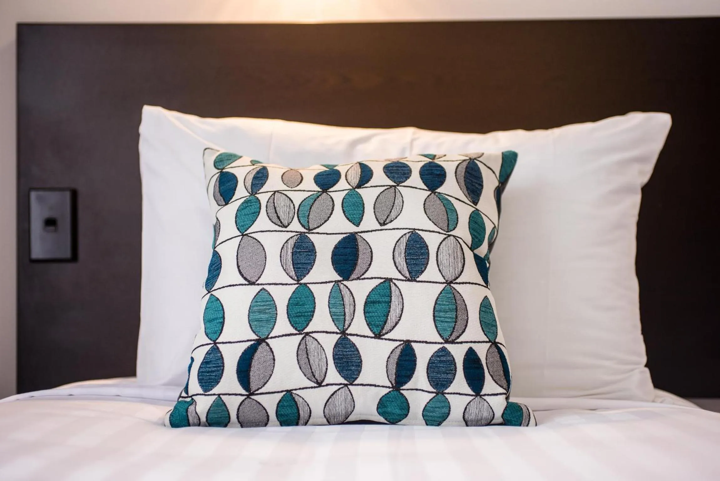 Bed in White Heron Motor Lodge