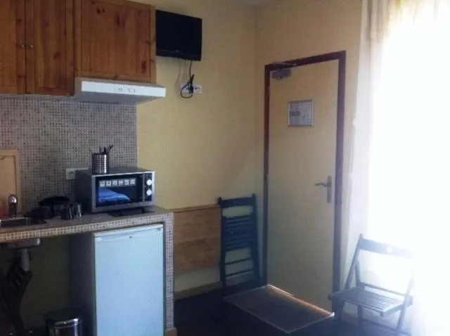 Kitchen or kitchenette in Résidence Molière Hôtel Paris Montrouge