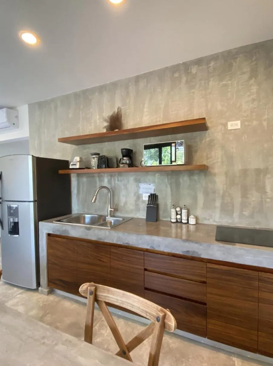 Kitchen or kitchenette in Panacea Condo Tulum