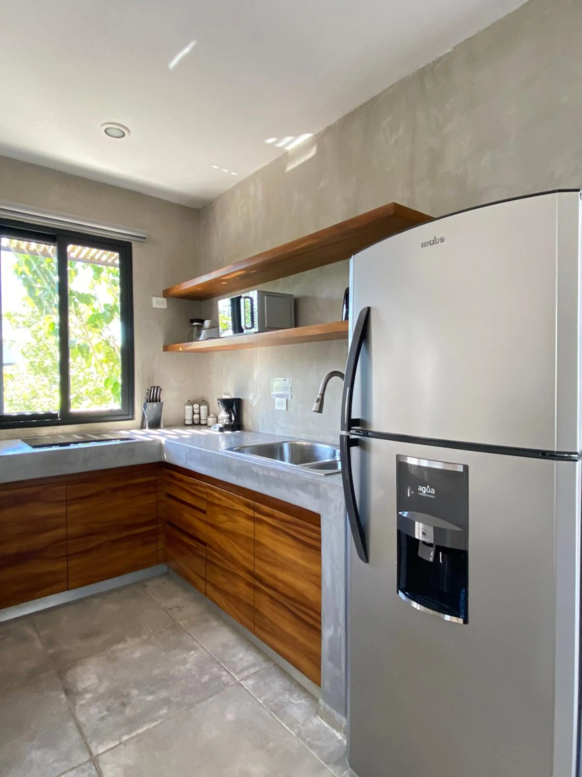 Kitchen or kitchenette in Panacea Condo Tulum