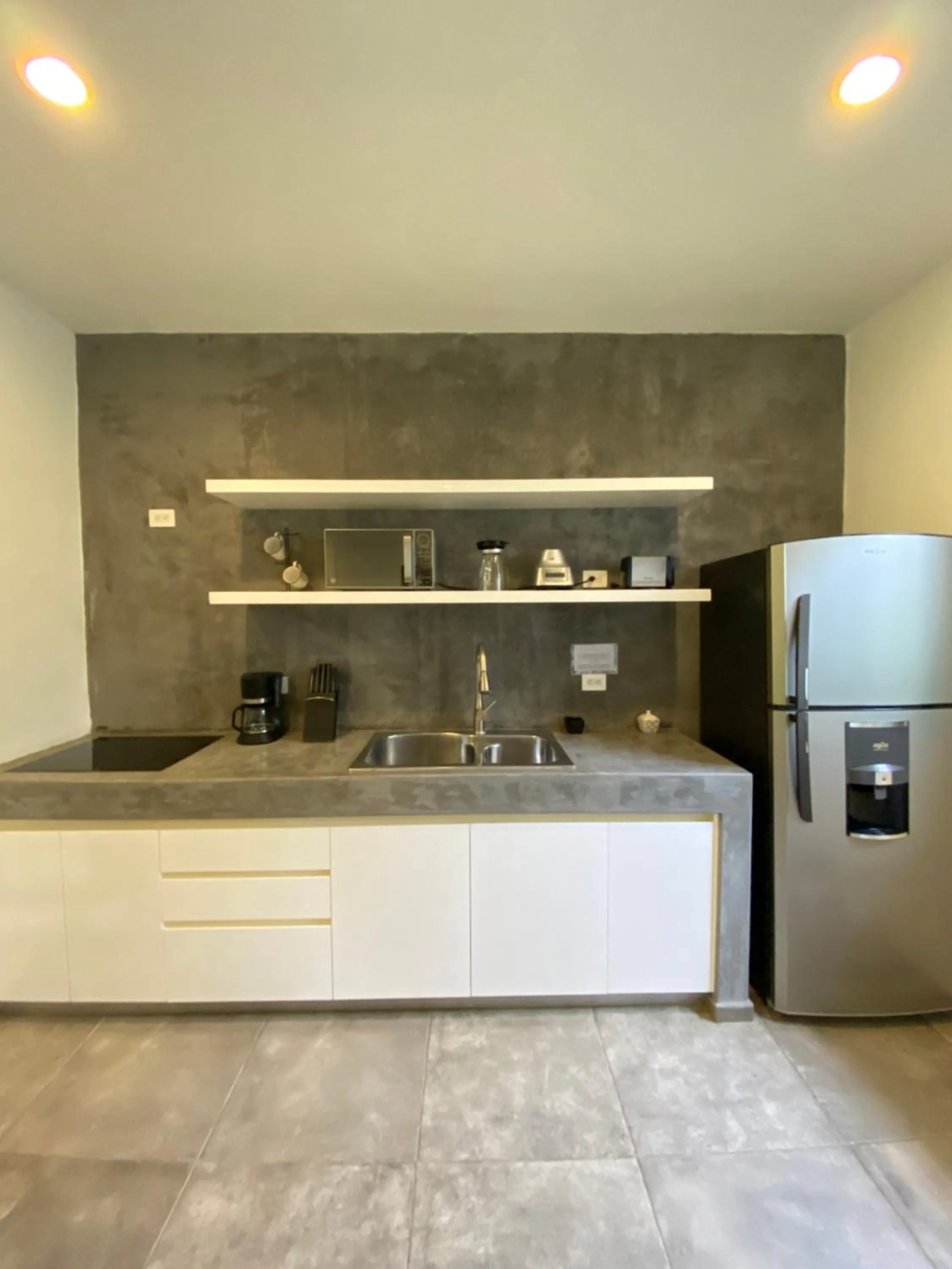 Kitchen or kitchenette in Panacea Condo Tulum