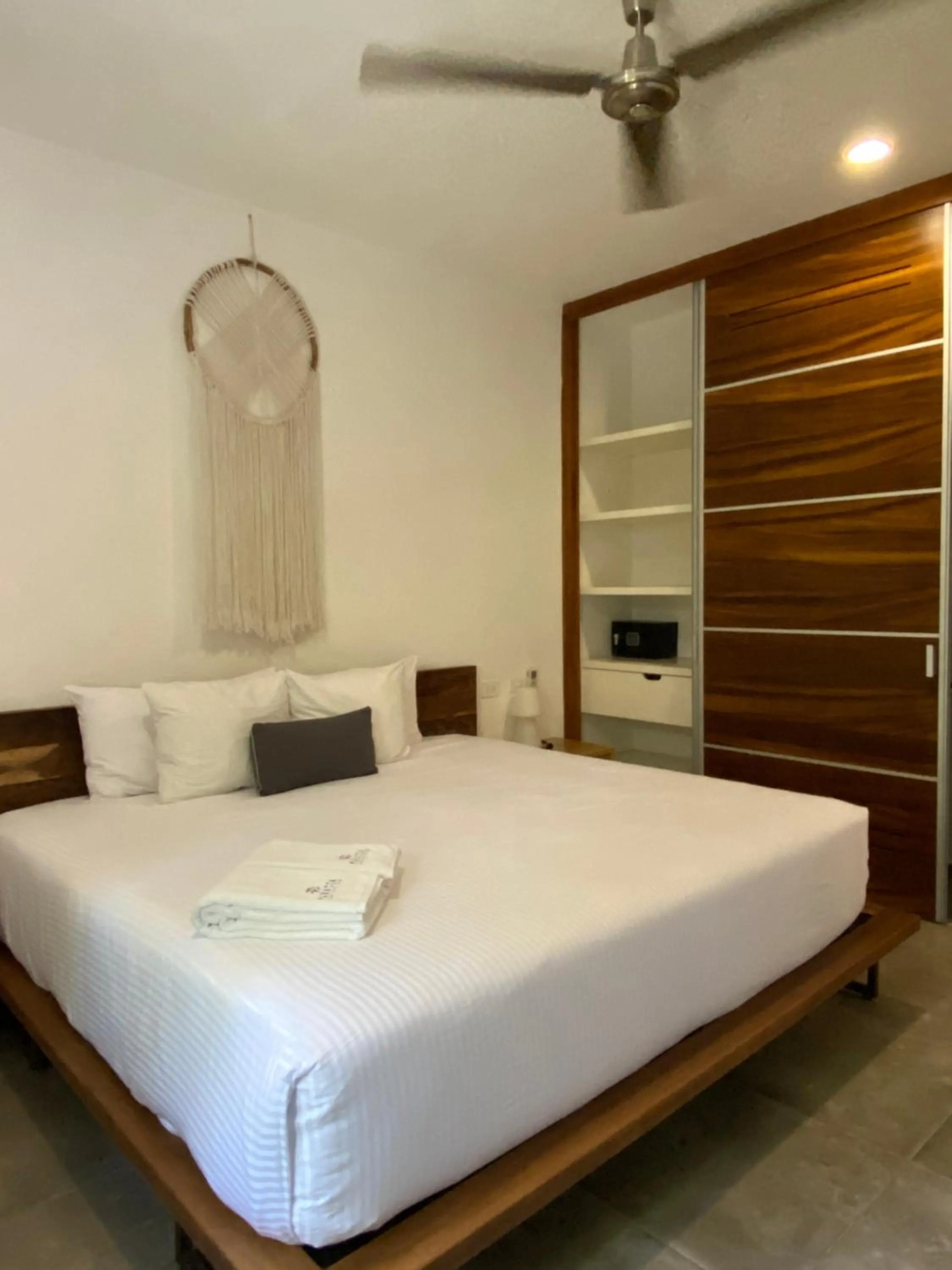 Bed in Panacea Condo Tulum