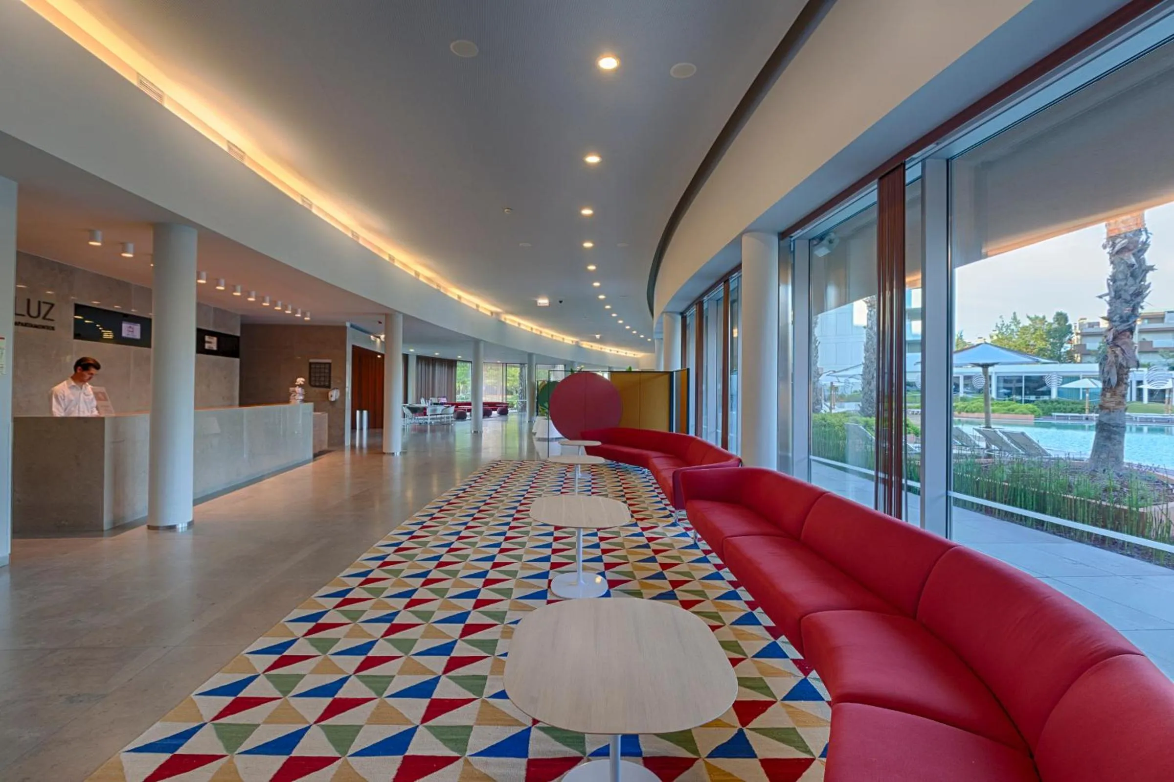Lobby or reception in Aqualuz Troia Rio by The Editory