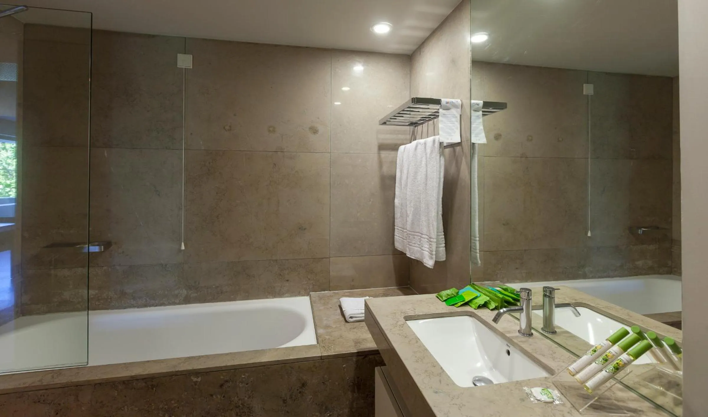 Bathroom in Aqualuz Troia Rio by The Editory