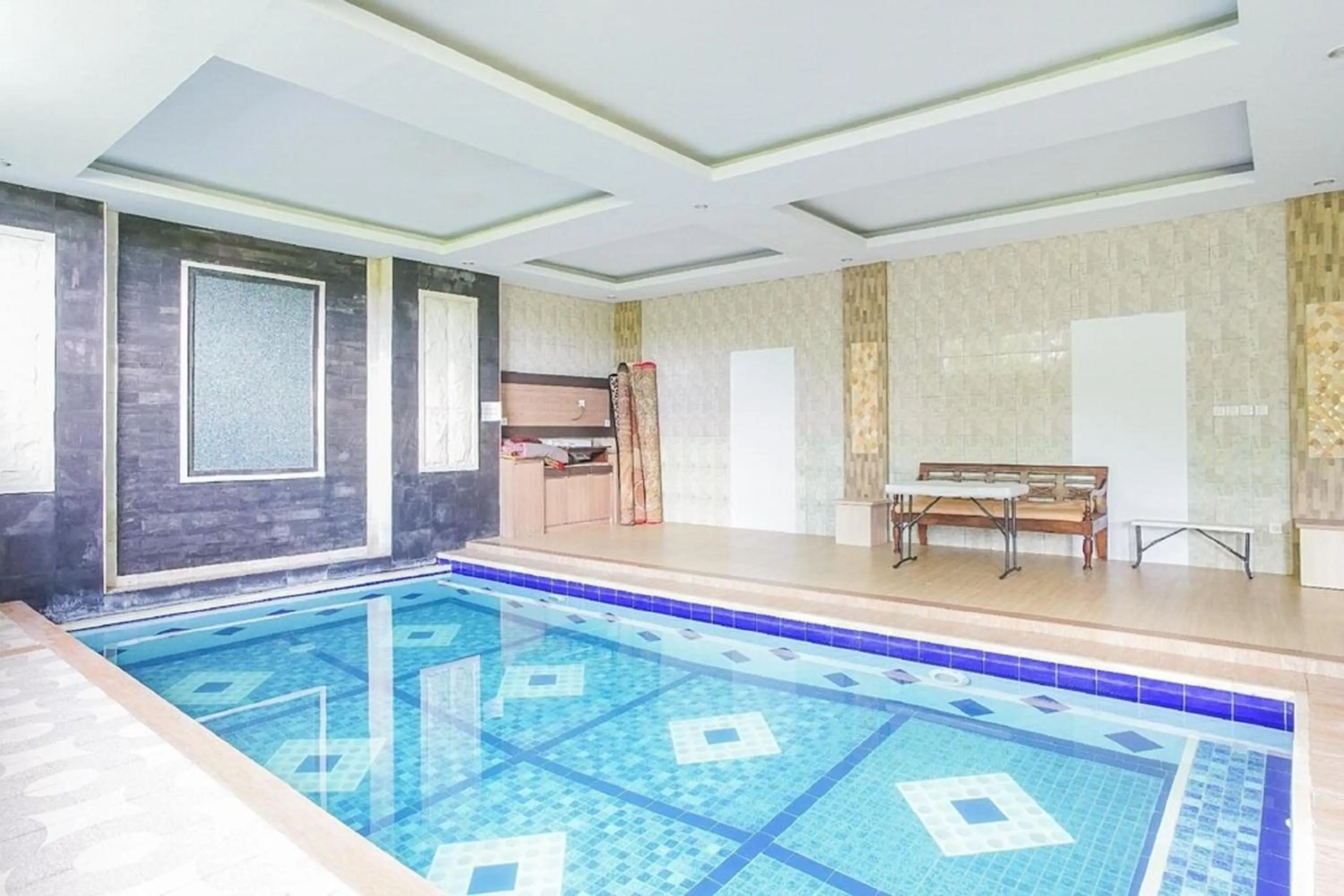 Swimming pool in RedDoorz near Muaya Beach Jimbaran