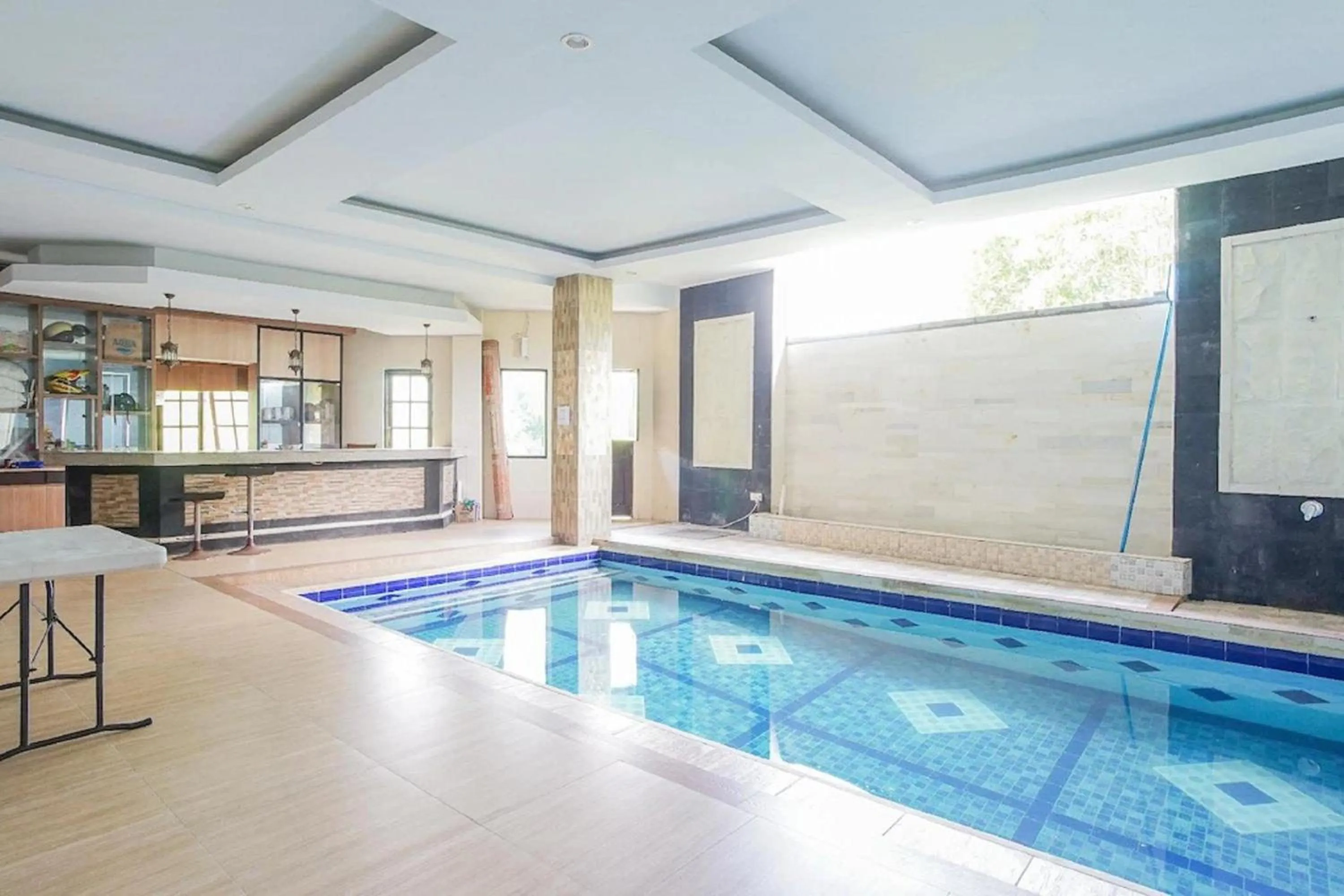 Swimming pool in RedDoorz near Muaya Beach Jimbaran