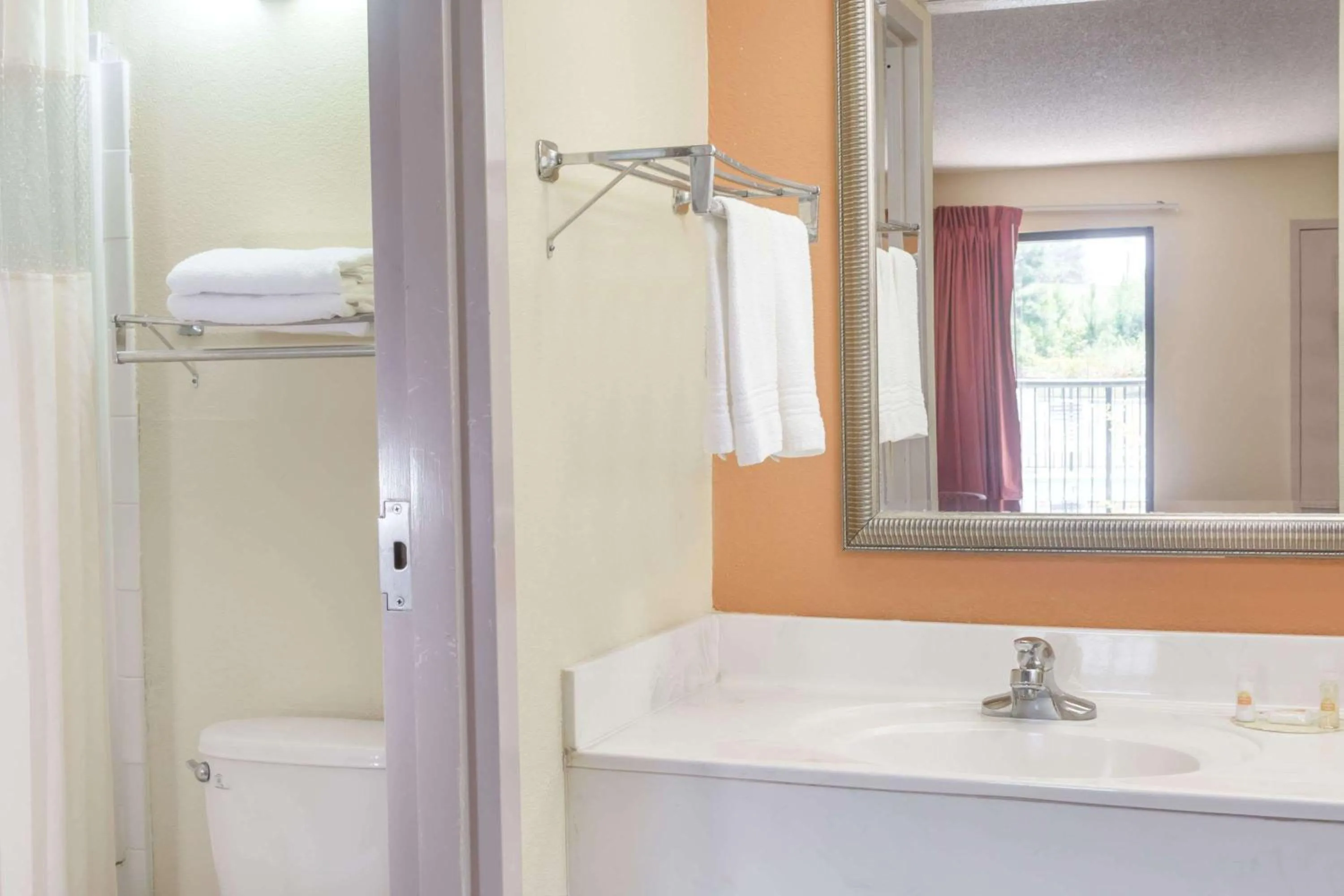 Bathroom in Days Inn by Wyndham Sanford