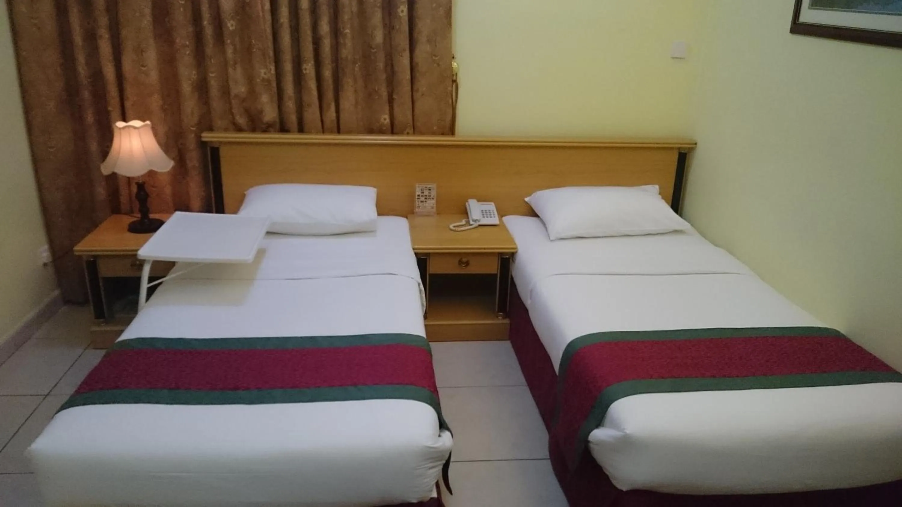 Bed in Muscat International Hotel