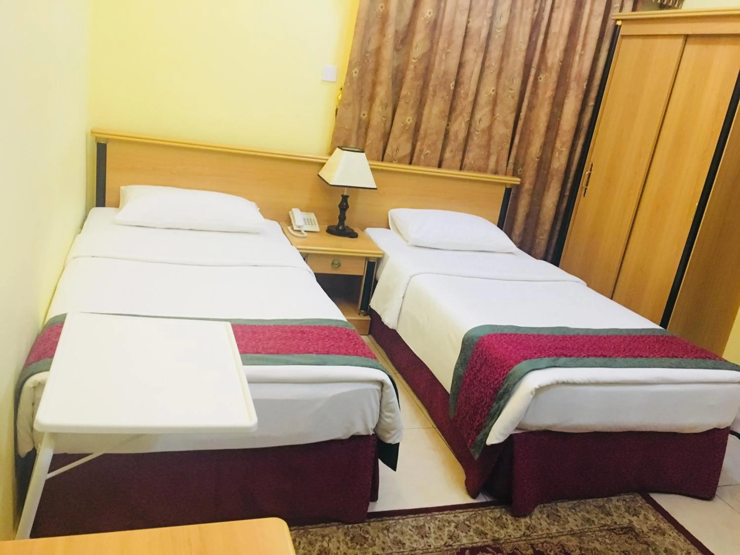 Bed in Muscat International Hotel