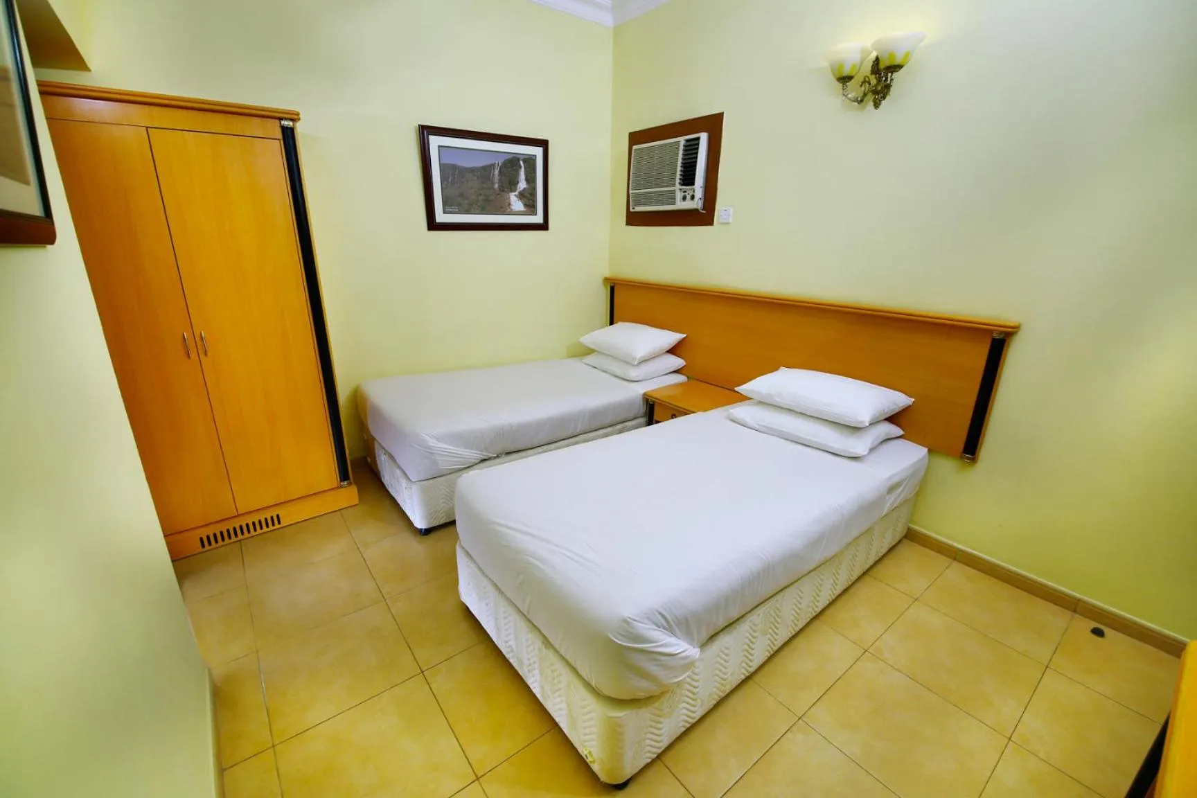 Bed in Muscat International Hotel