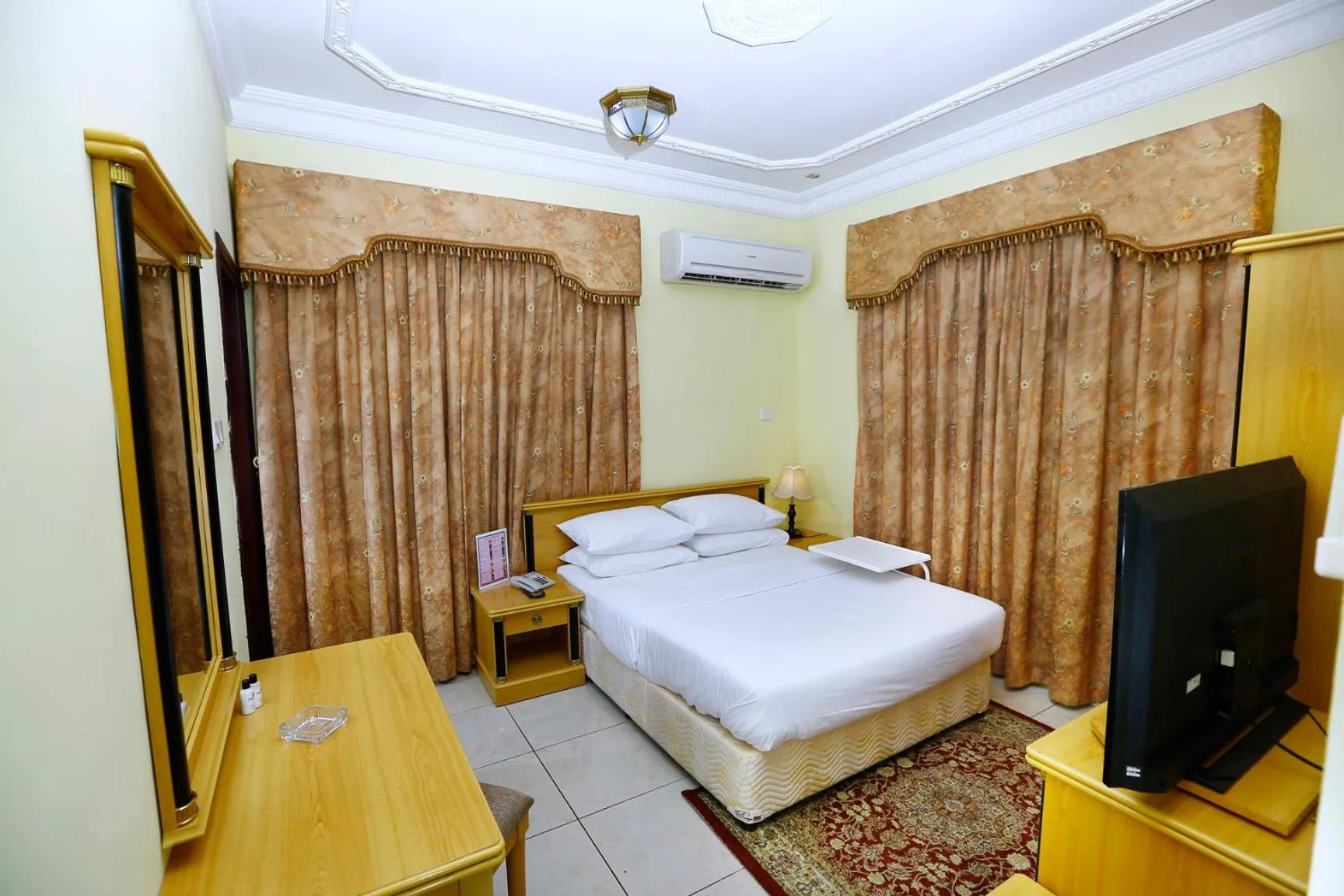 Bed in Muscat International Hotel