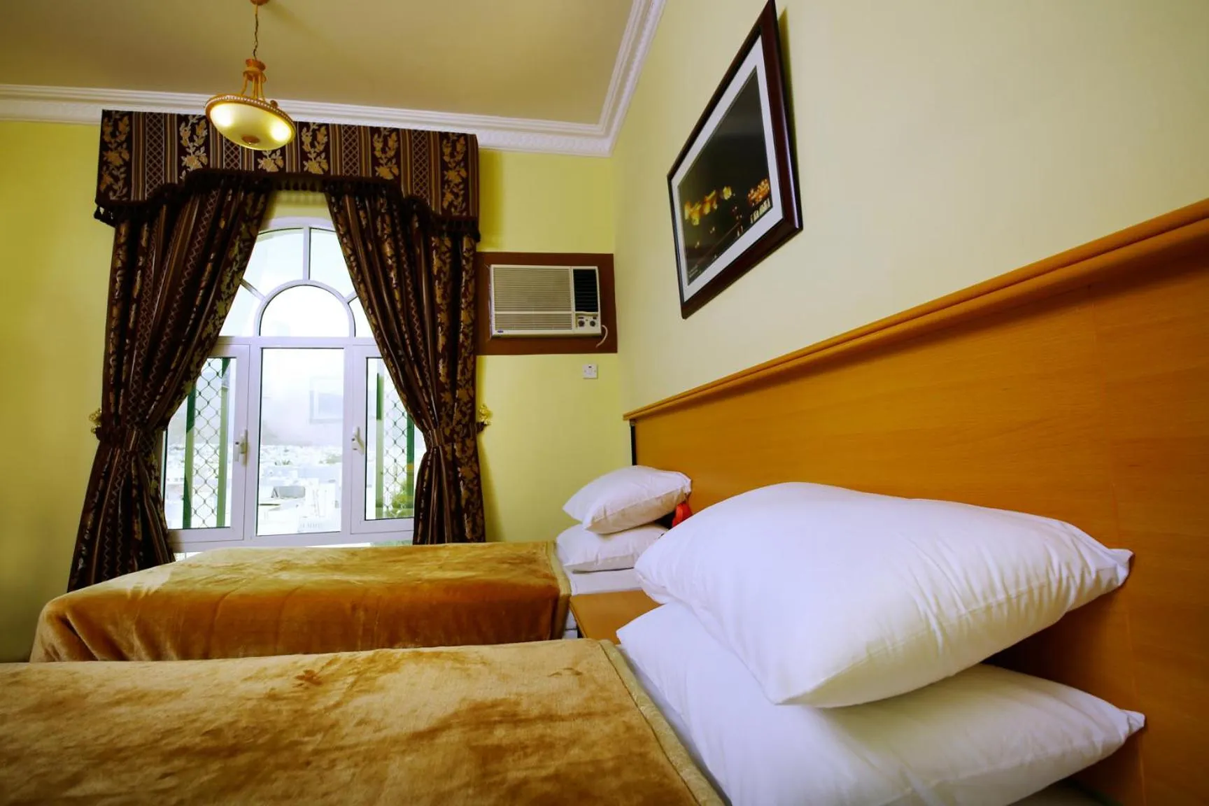 Bed in Muscat International Hotel