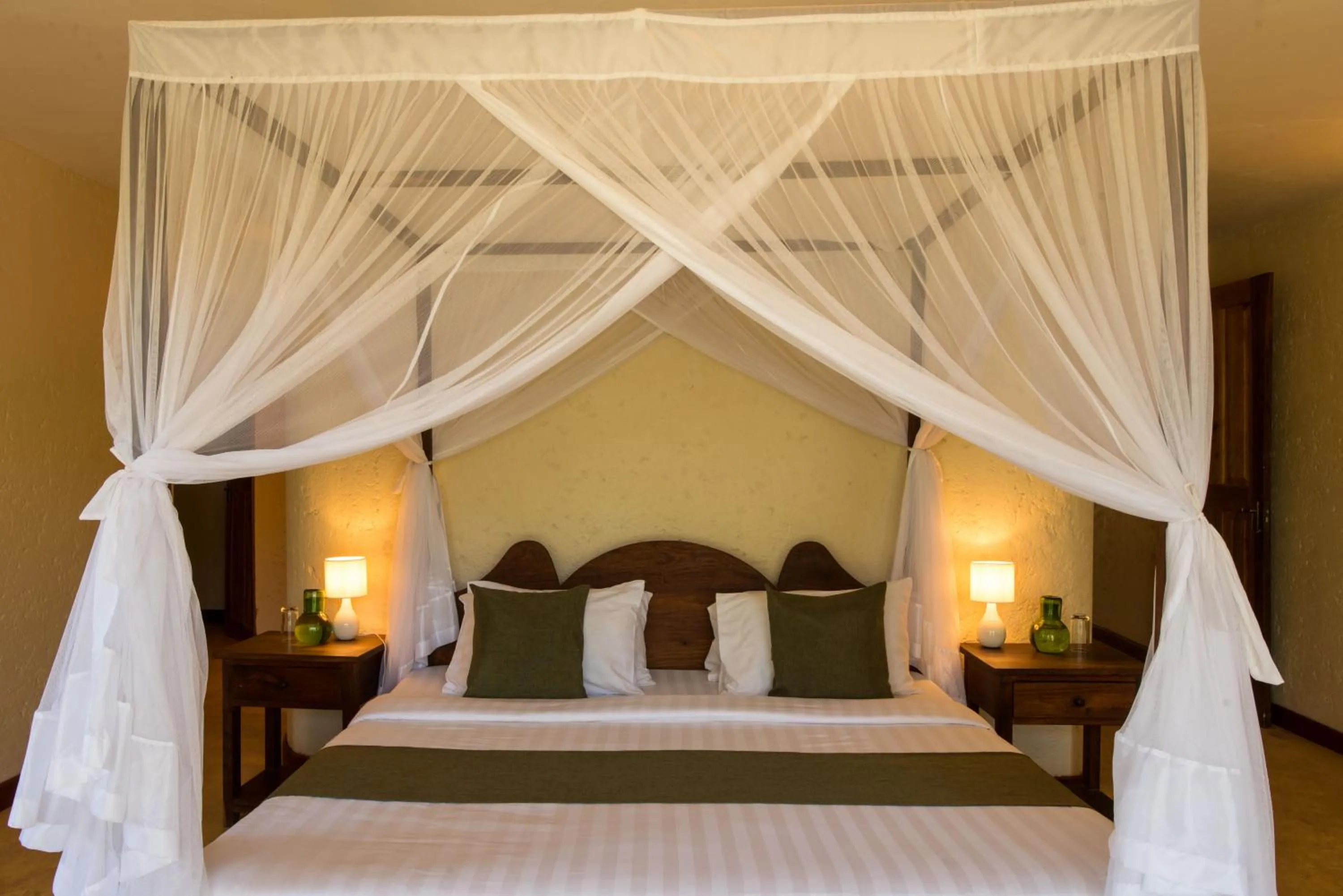Bed in Kili Villa Kilimanjaro Luxury Retreat