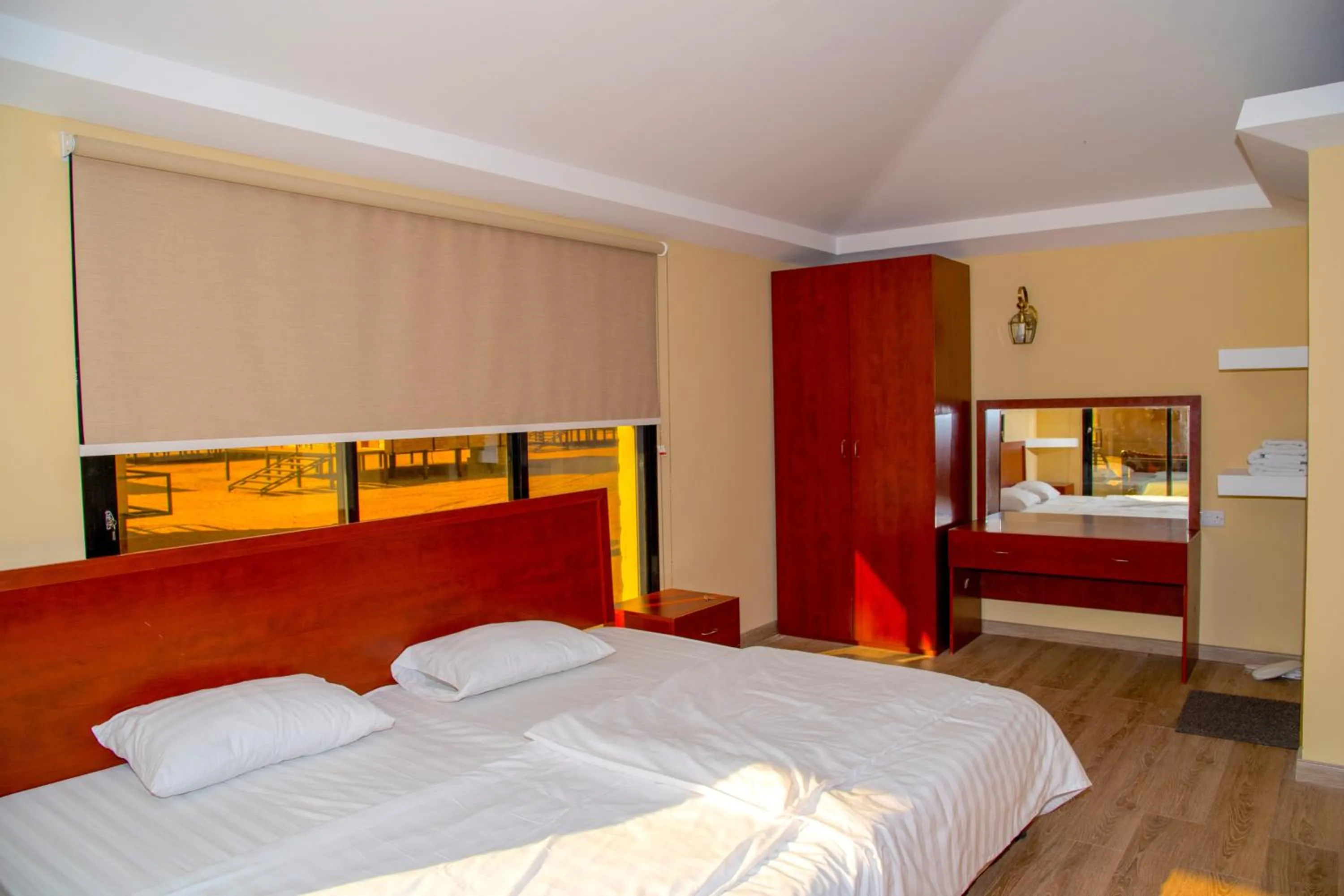 Bed in Arabian Oryx Camp