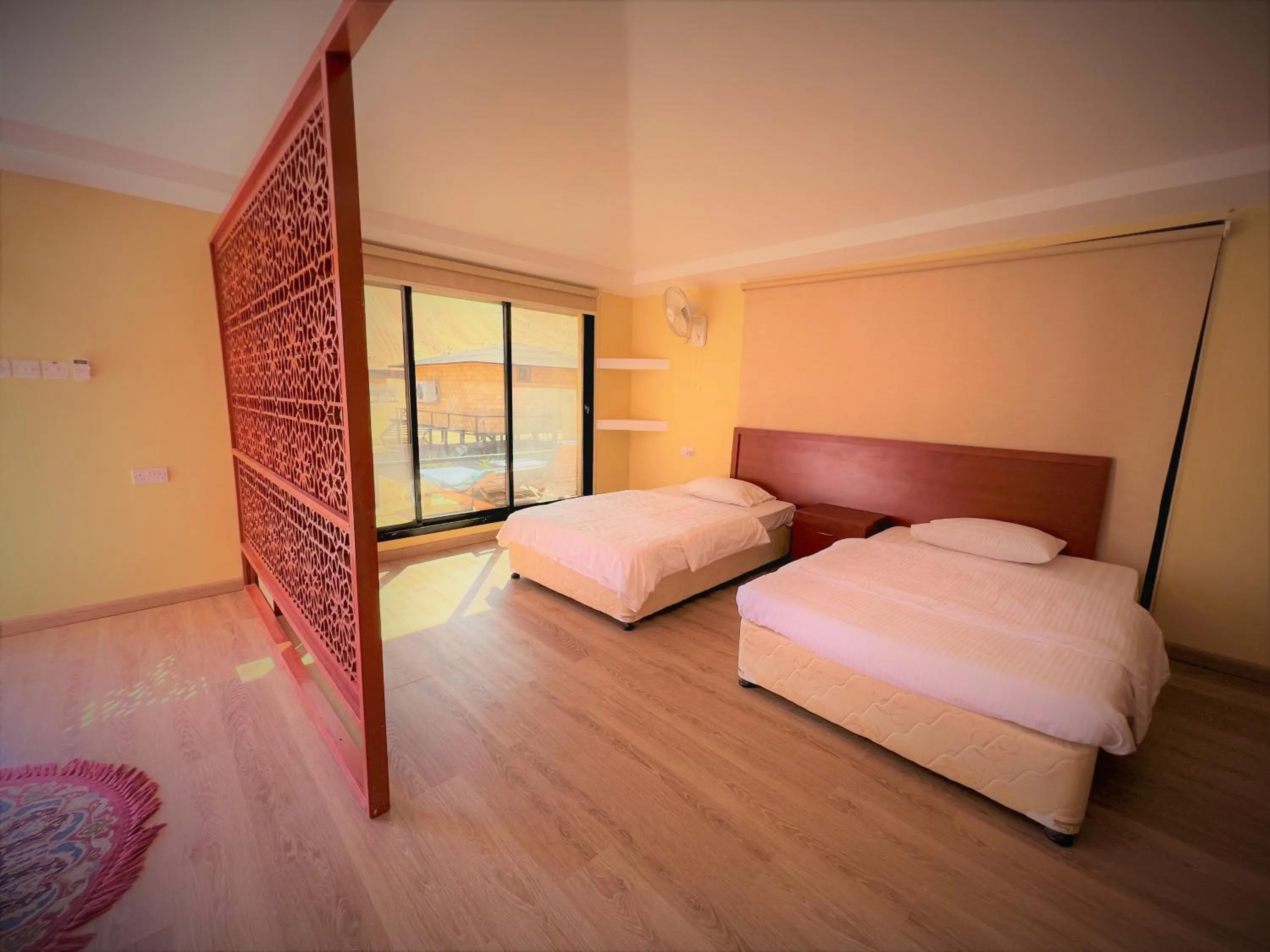 Bed in Arabian Oryx Camp