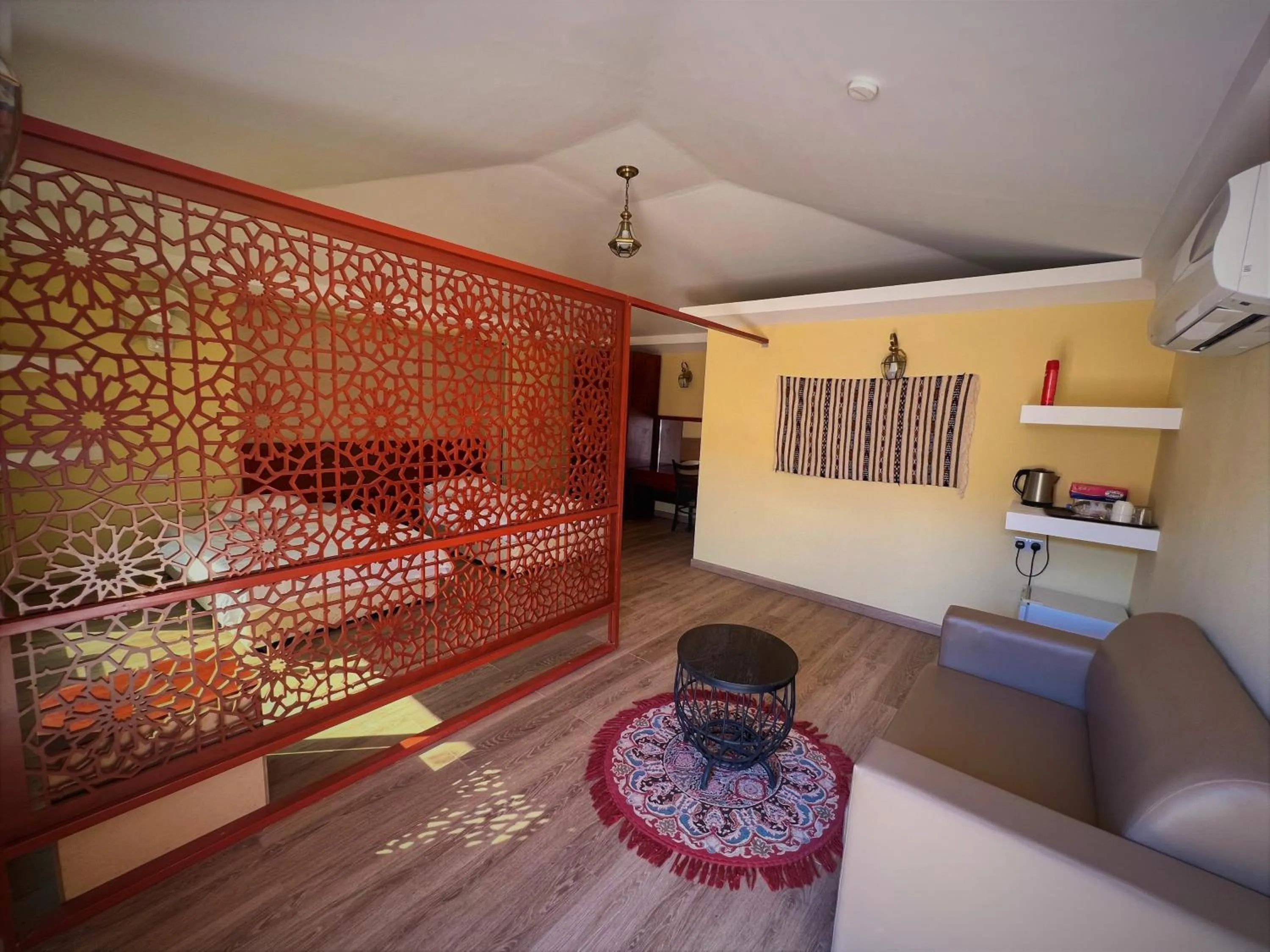 Bed in Arabian Oryx Camp