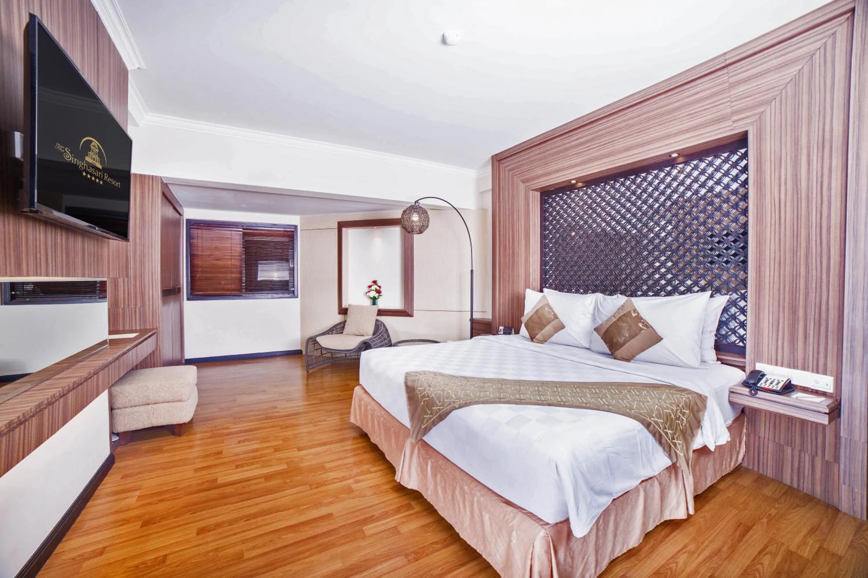 Bed in The Singhasari Resort Batu