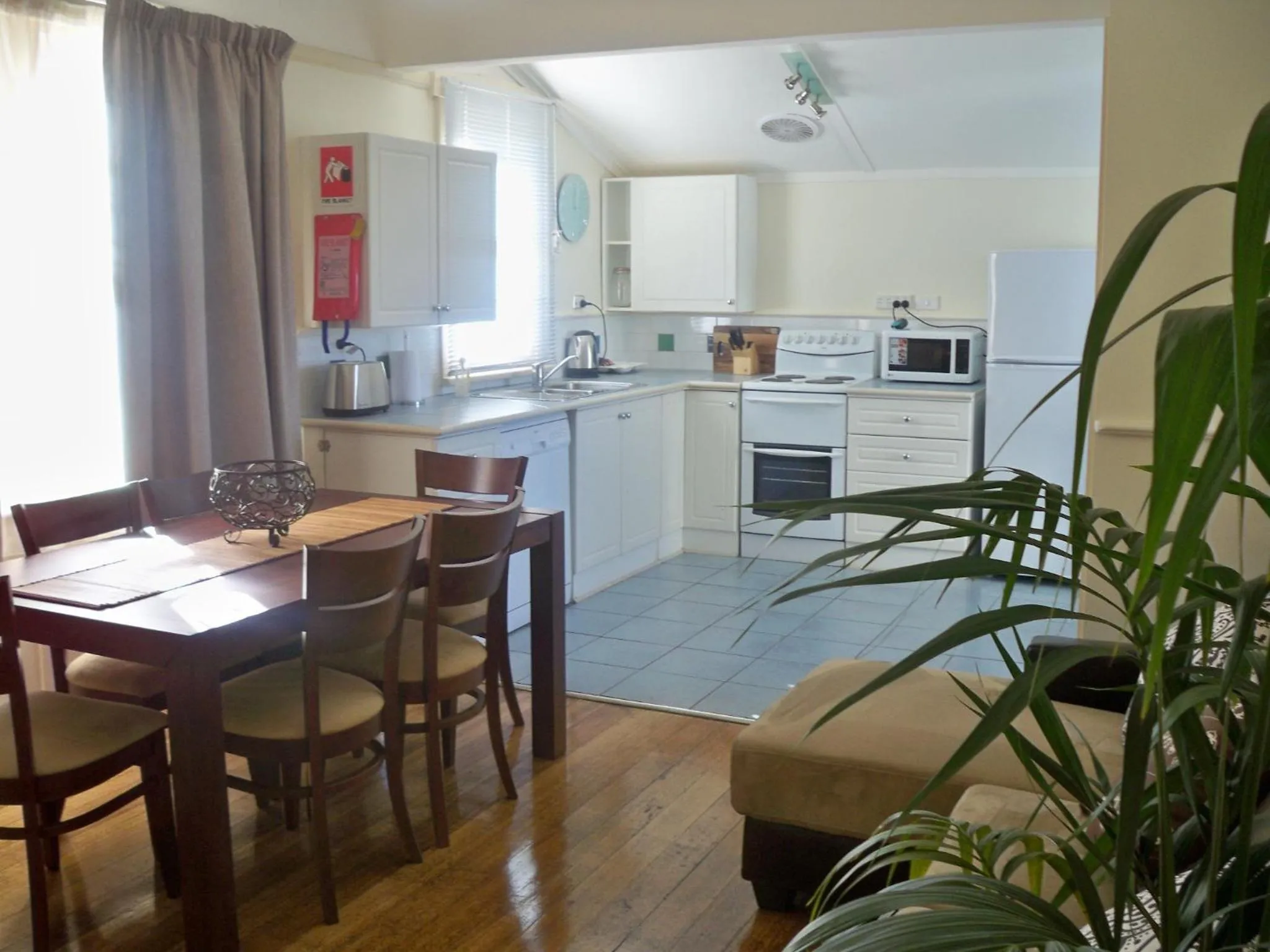 Kitchen or kitchenette in Moonah Central Apartments
