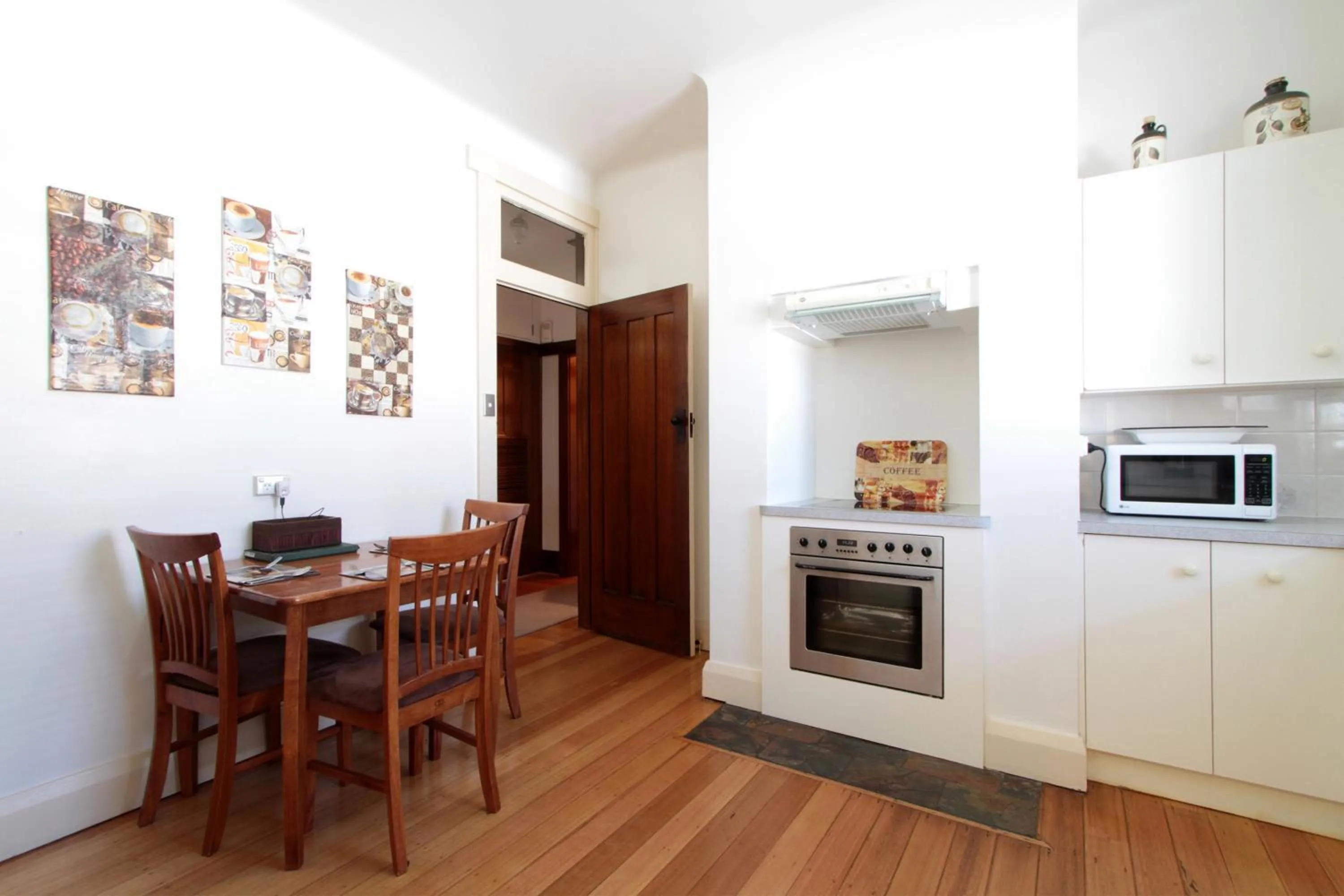 Kitchen or kitchenette in Moonah Central Apartments