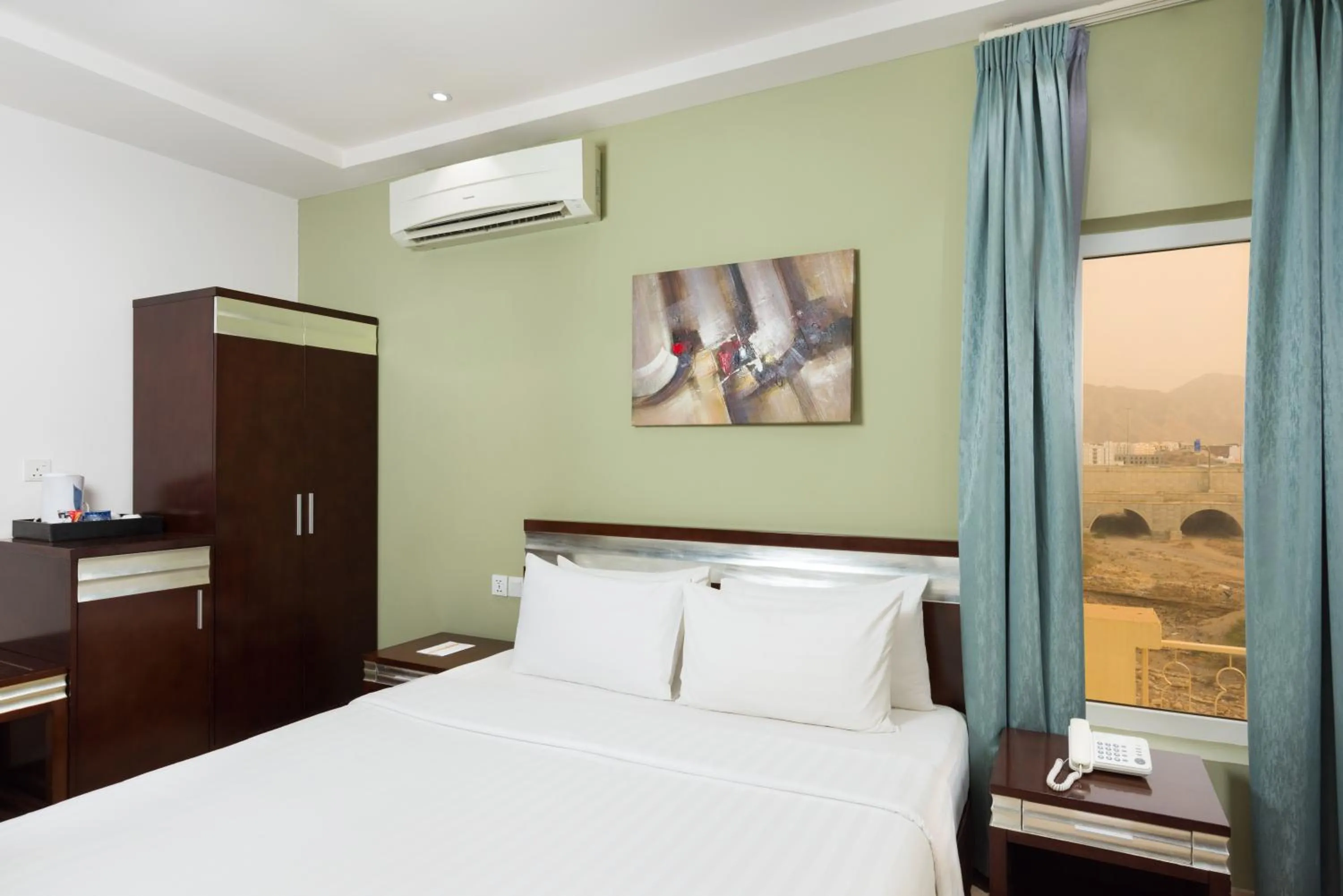 Bedroom in Centara Life Muscat Dunes Hotel