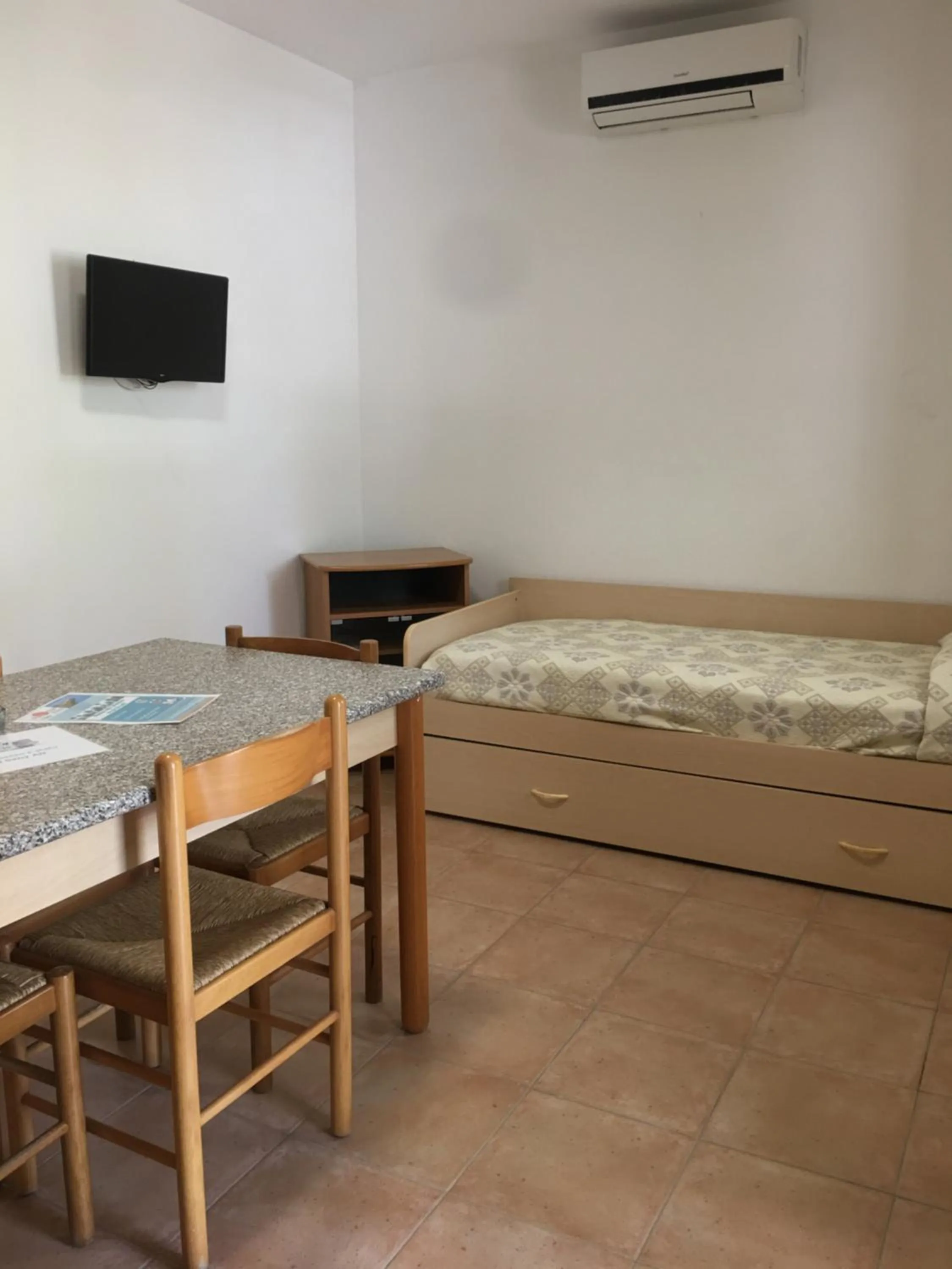 Living room, Bed in Residence Alba