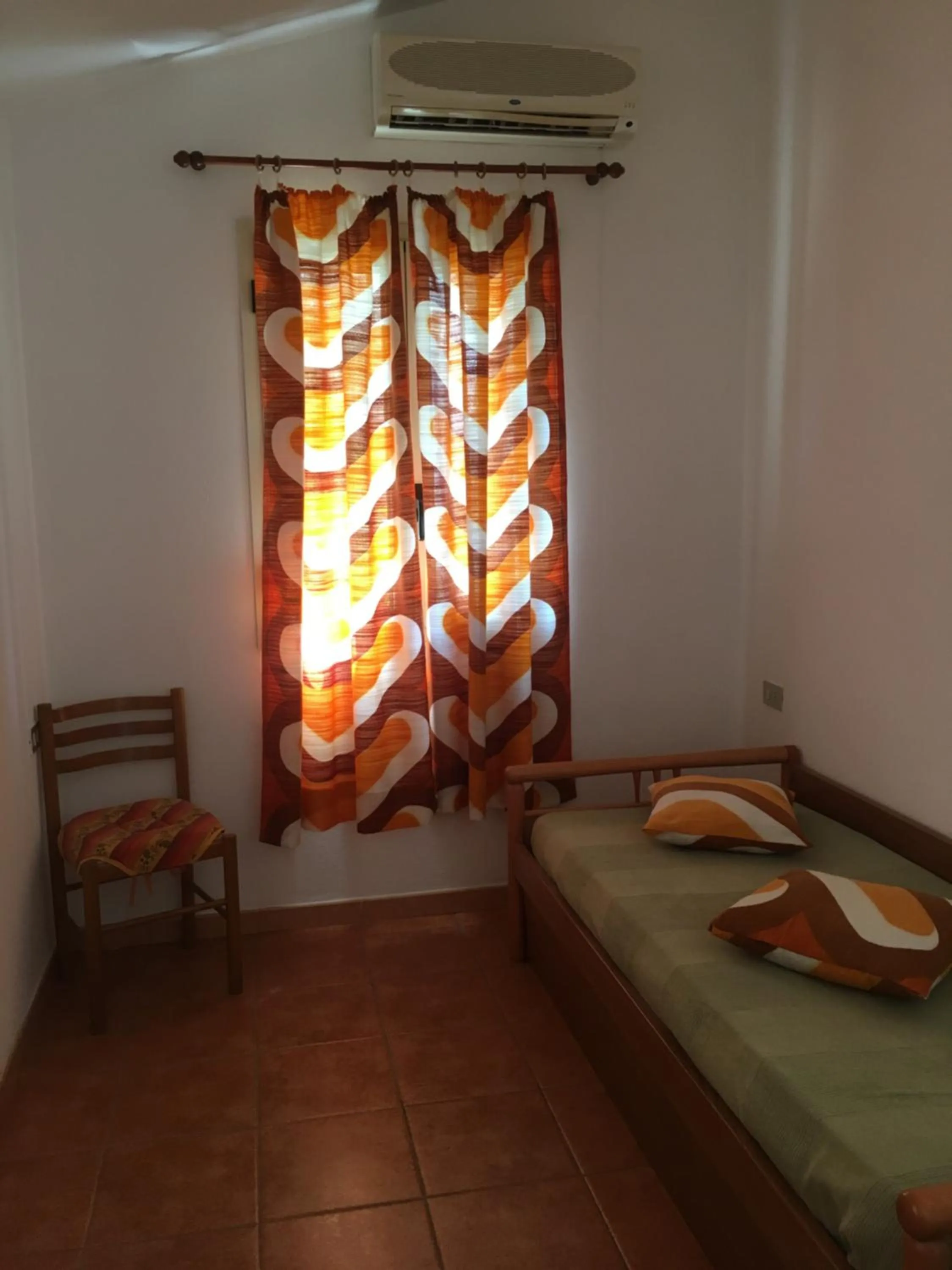 Living room, Bed in Residence Alba