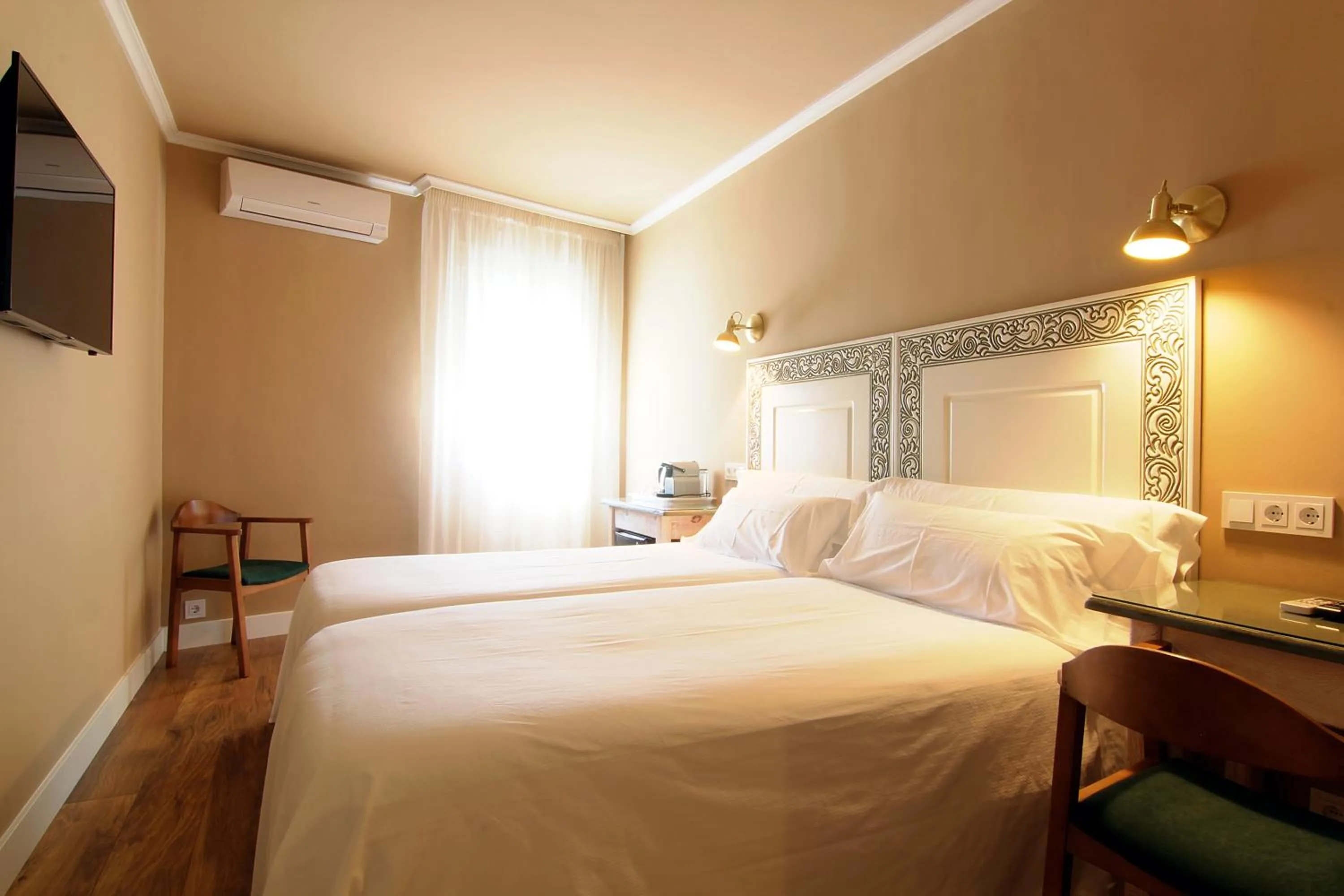 Bed in Hostal Los Castañuelos