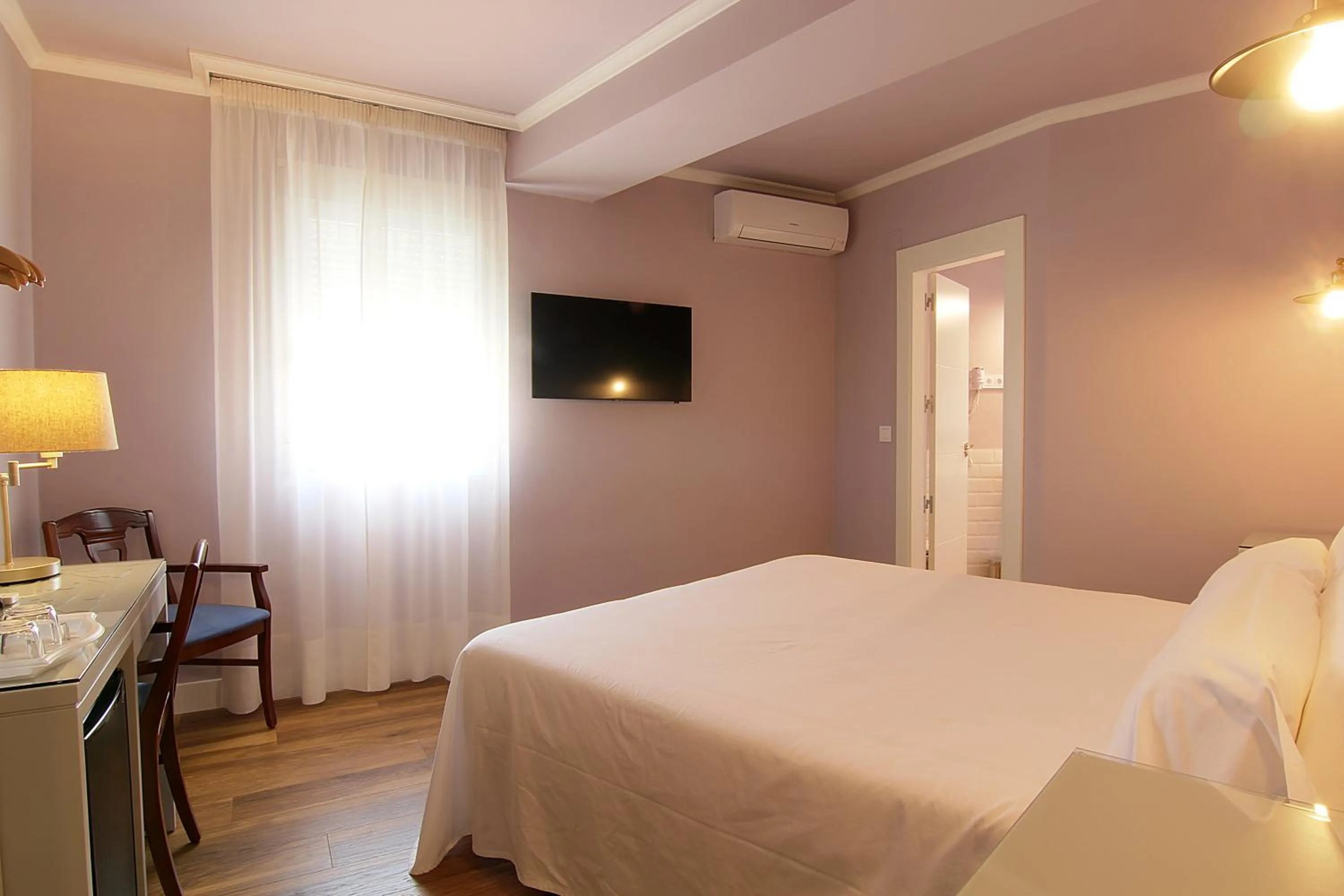 Bed in Hostal Los Castañuelos