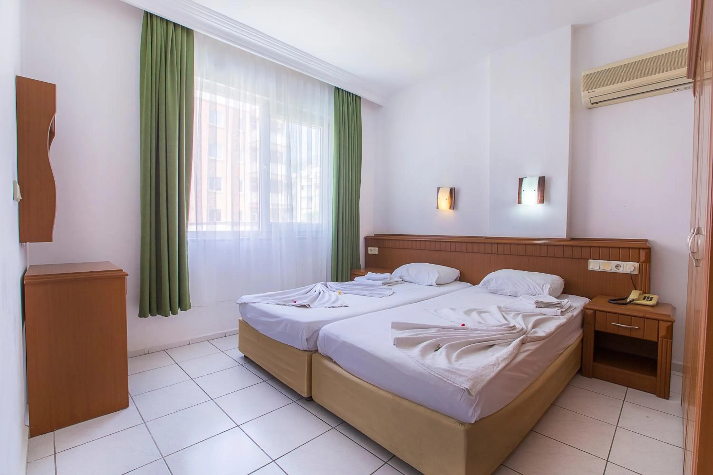 Bed in Bayram Apart Hotel