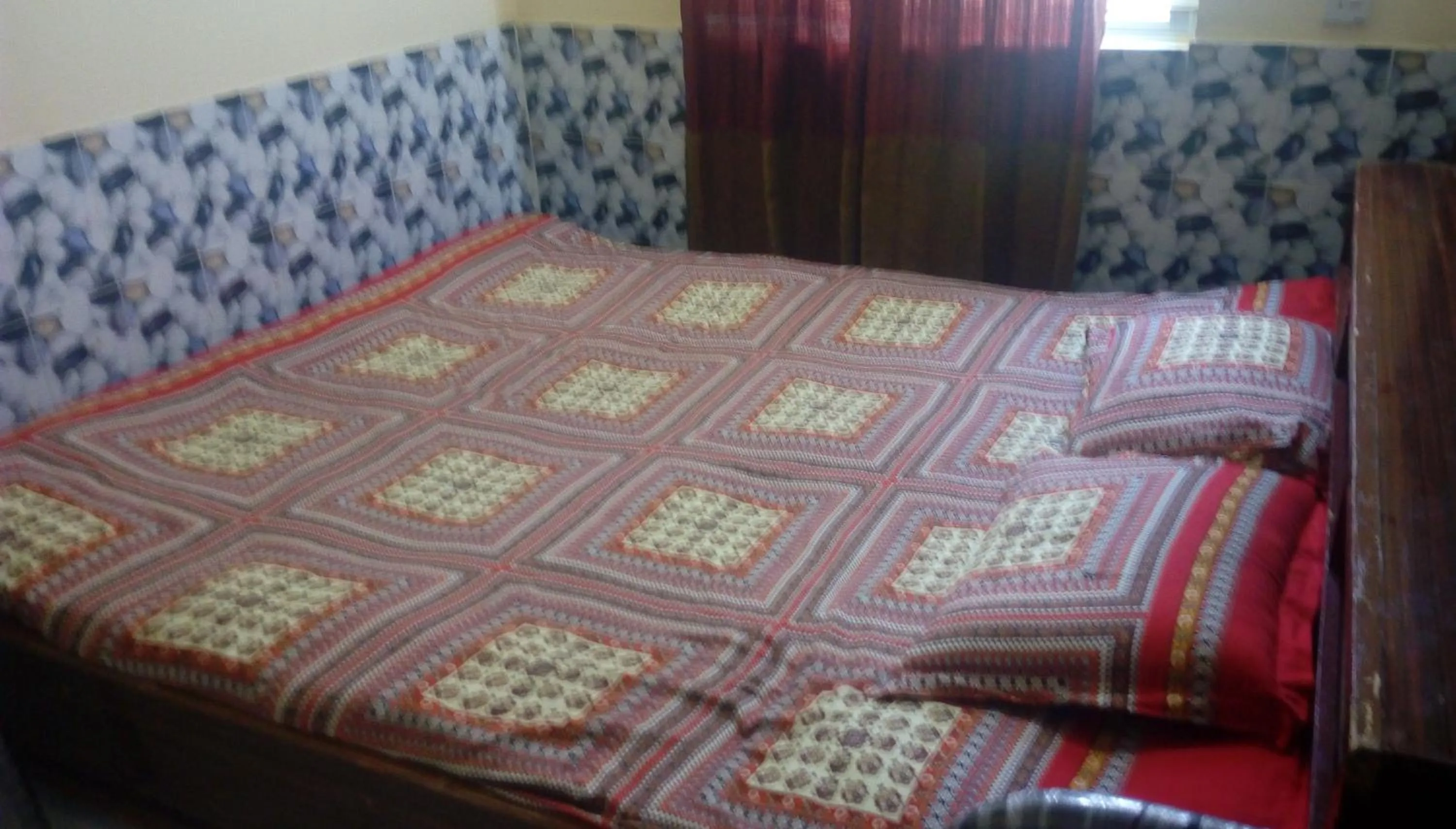 Bed in Hotel Regal Palace