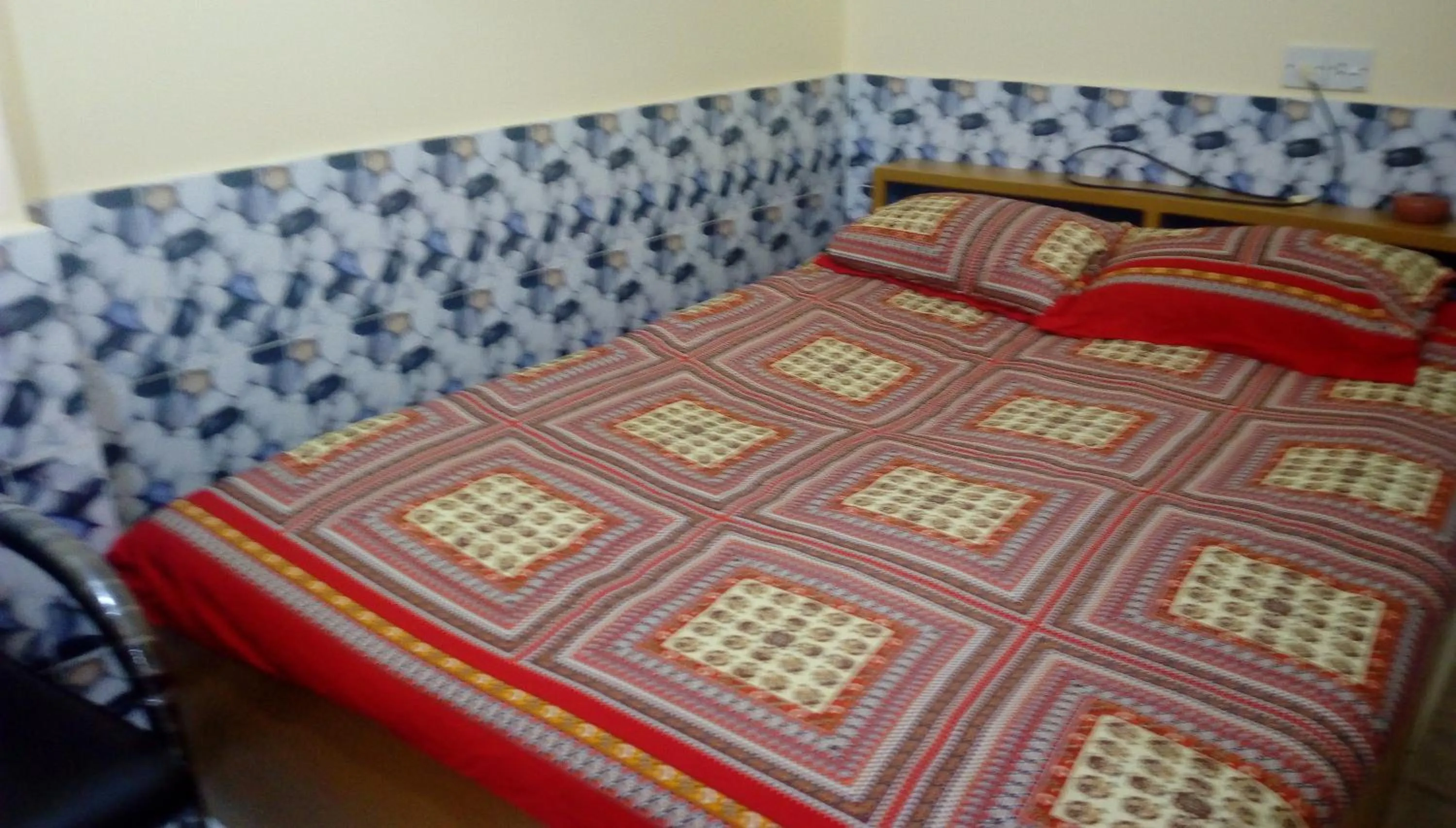 Bed in Hotel Regal Palace