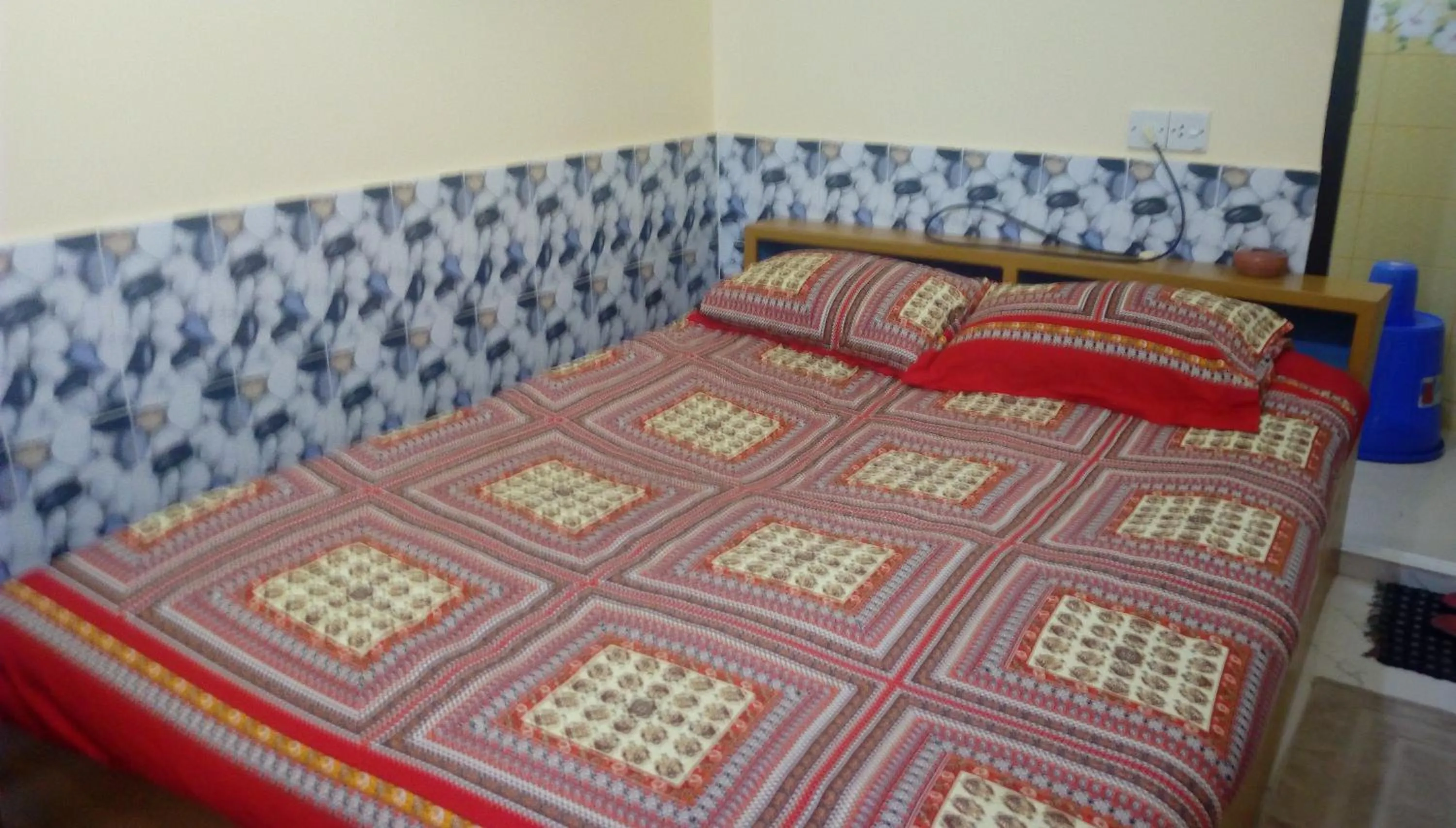 Bed in Hotel Regal Palace