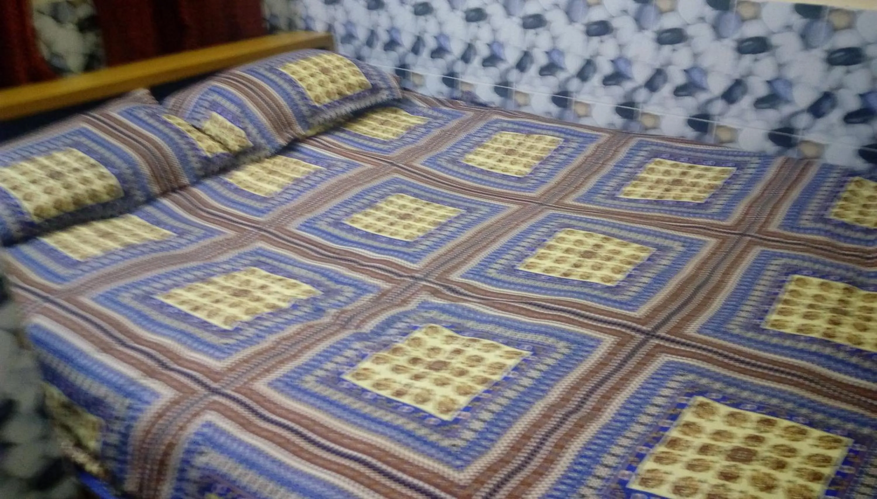 Bed in Hotel Regal Palace