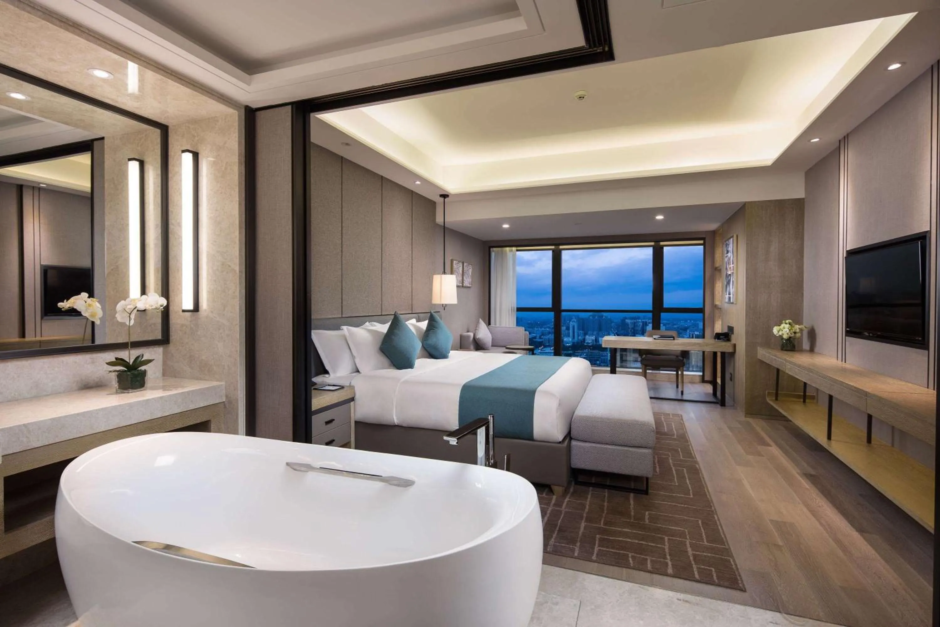 Photo of the whole room, Bed in Wyndham Grand Maoming