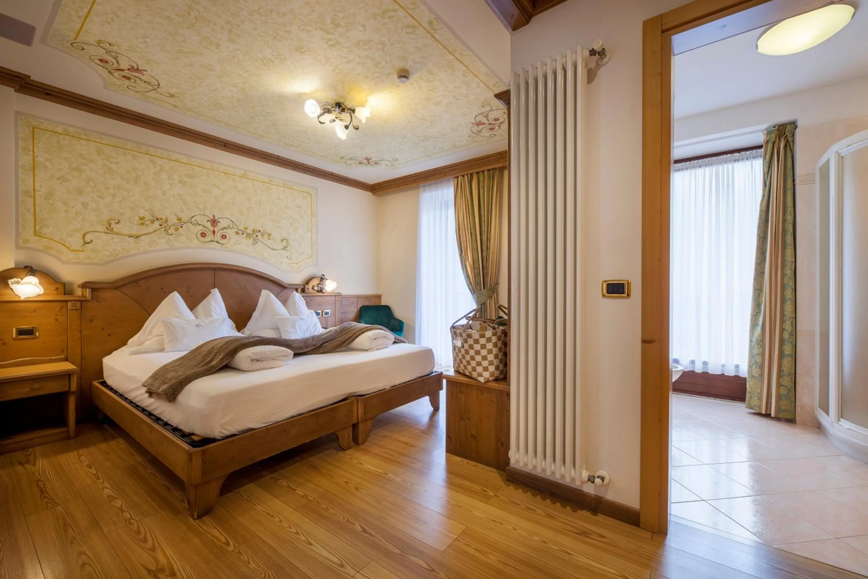 Bed in ADLER MERYEM wellness hotel - Andalo