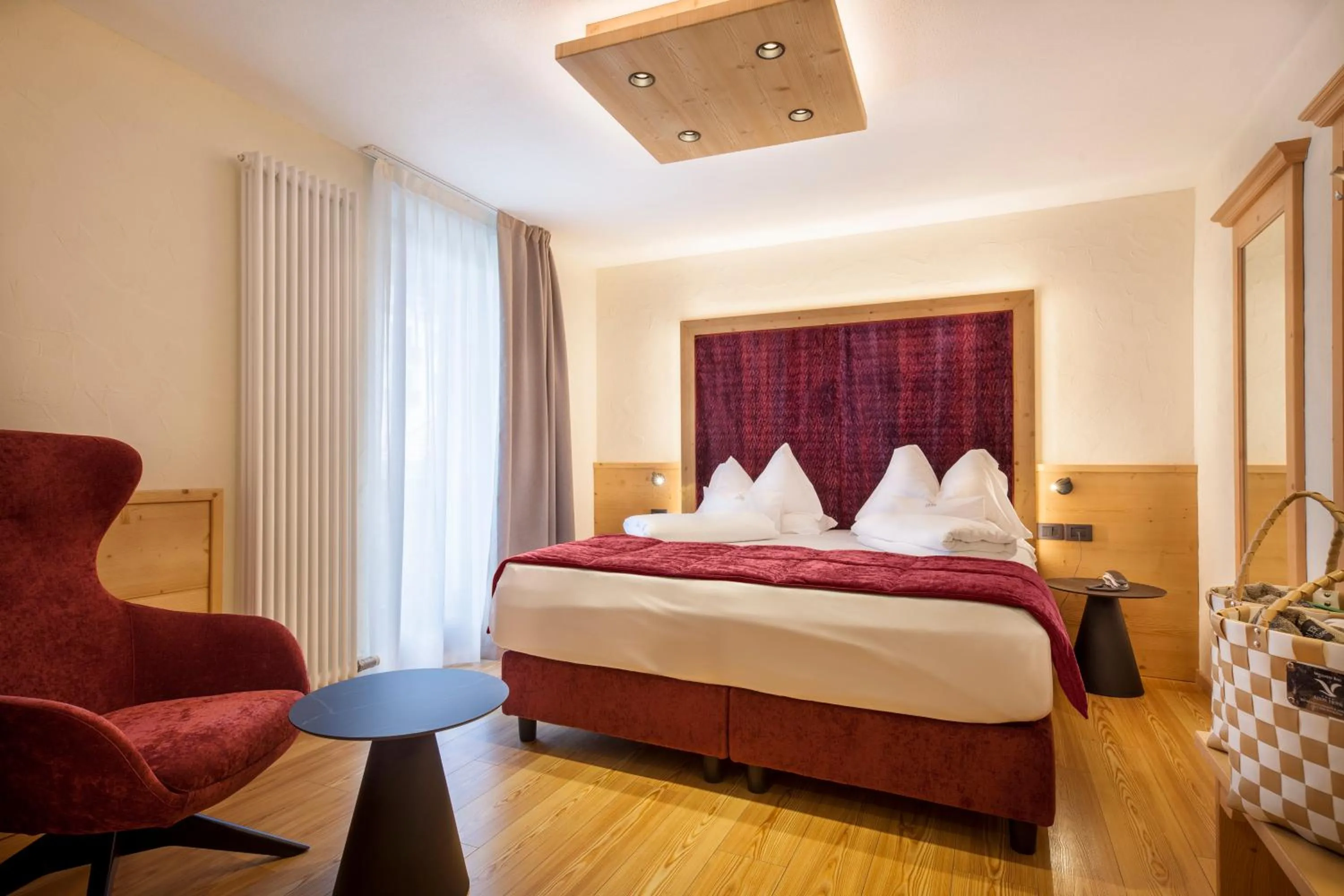 Bed in ADLER MERYEM wellness hotel - Andalo
