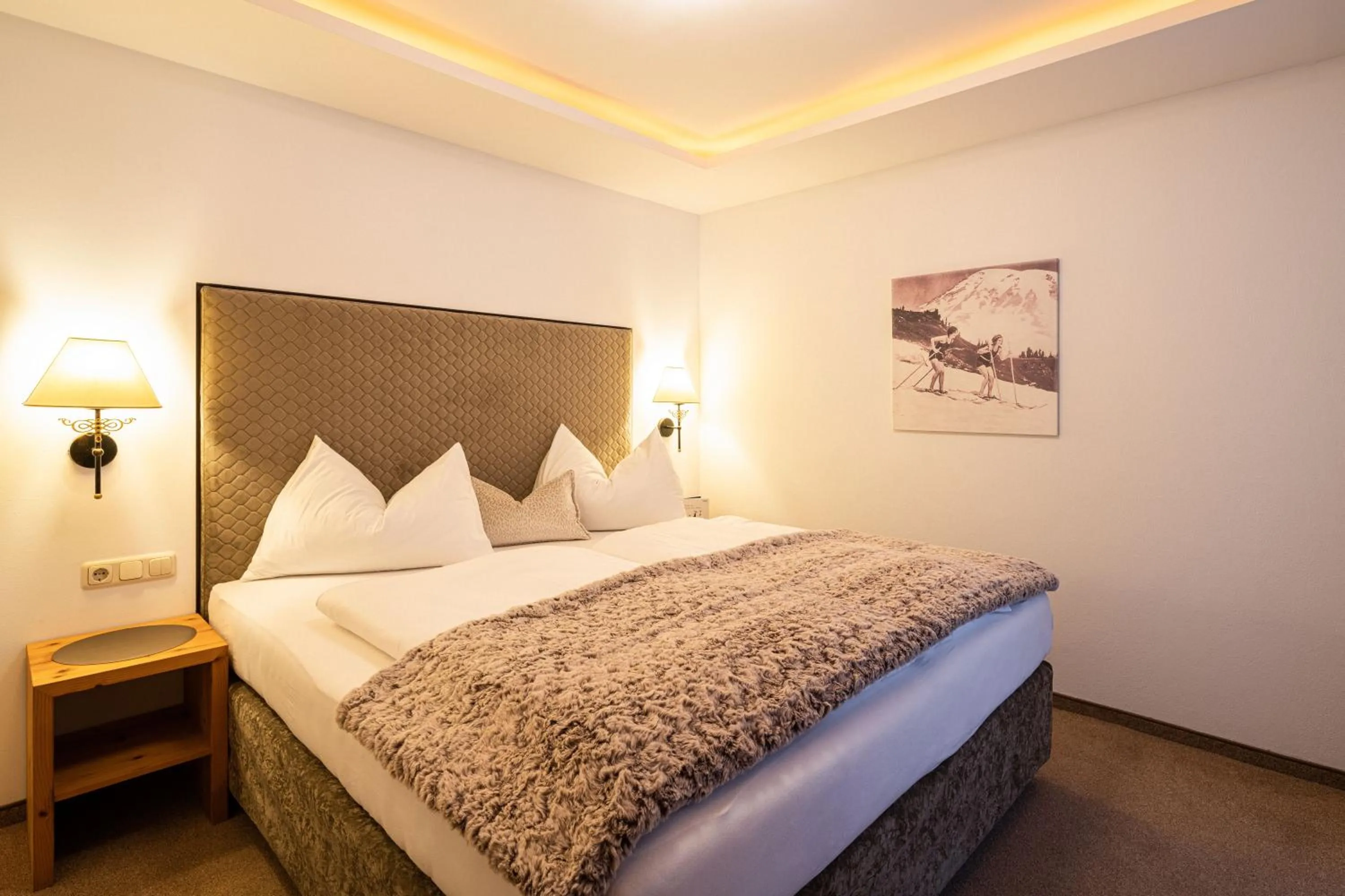 Bed in Hotel Hubertus