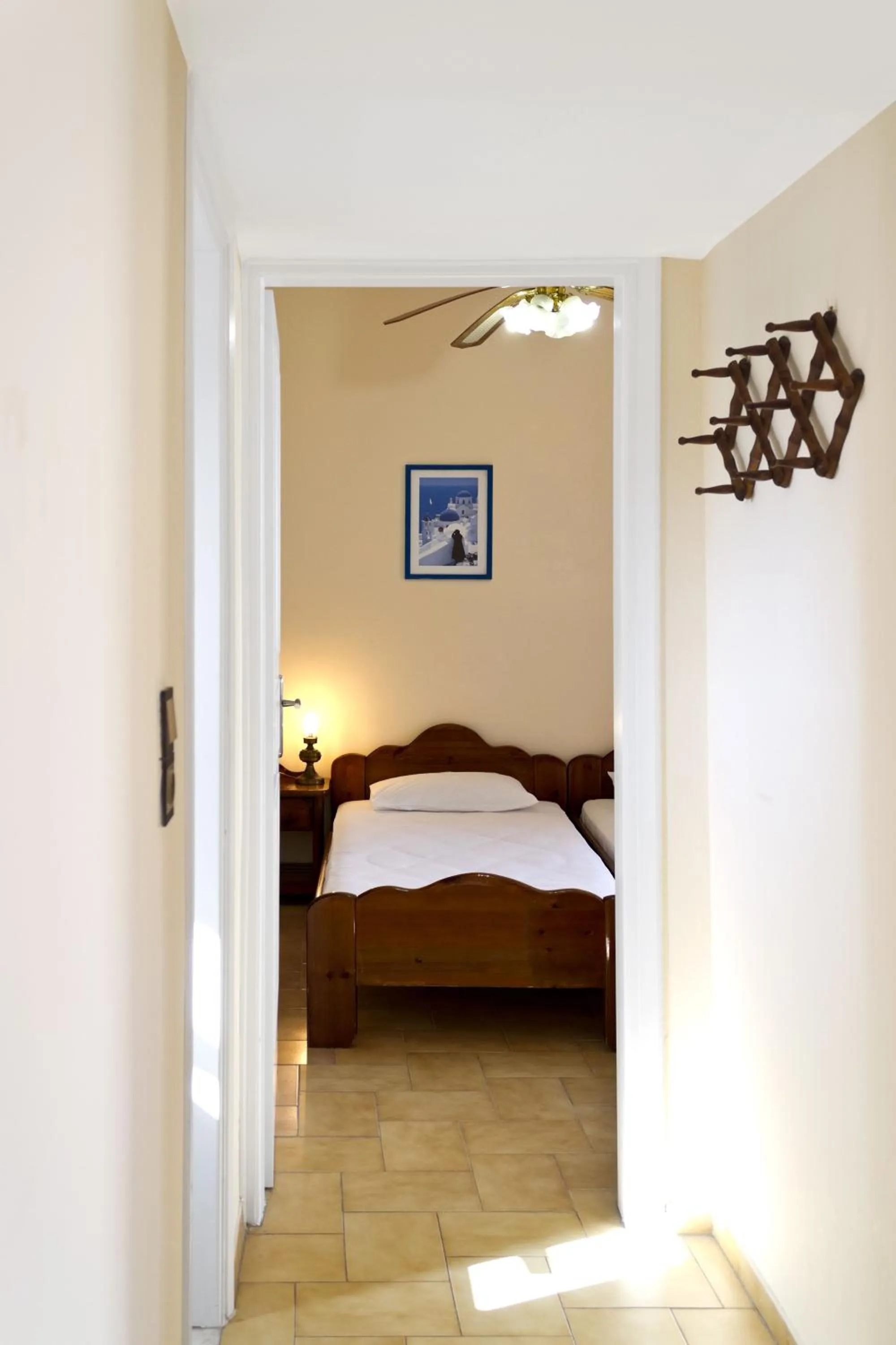 Bed in Dolphins Apartments