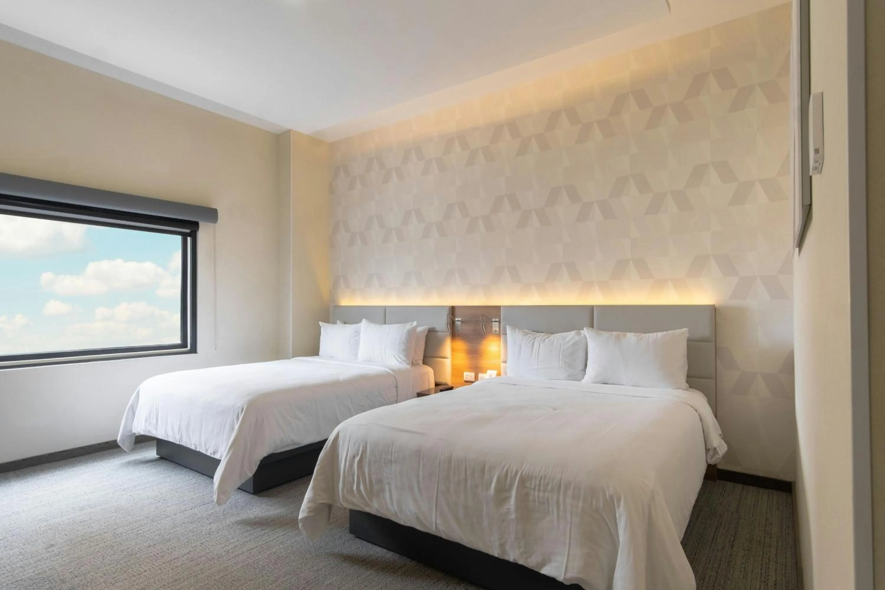 Photo of the whole room, Bed in SJ Grand Hotel Monterrey