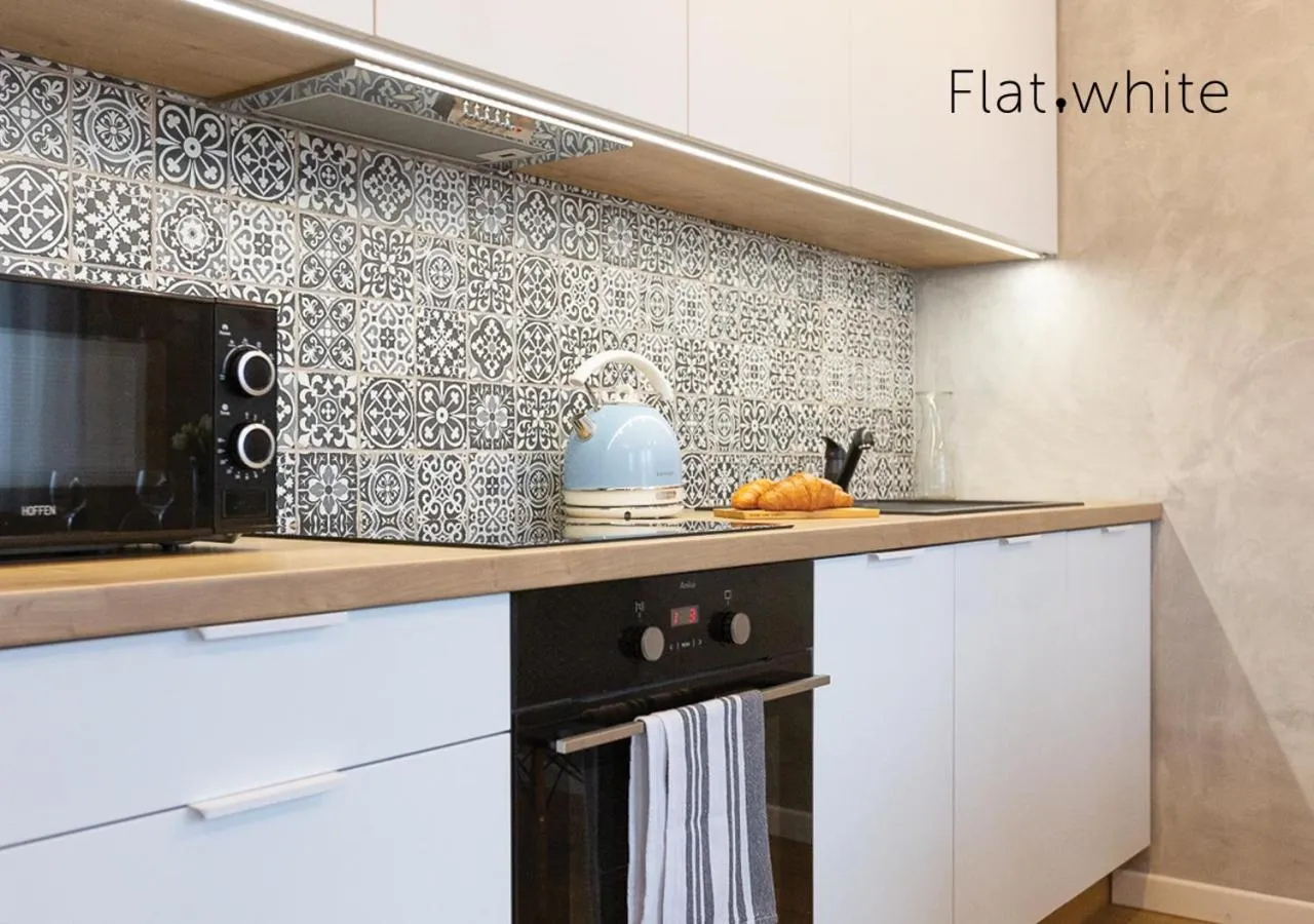 Kitchen or kitchenette in Apartamenty Flat White Zamkowa 4-6