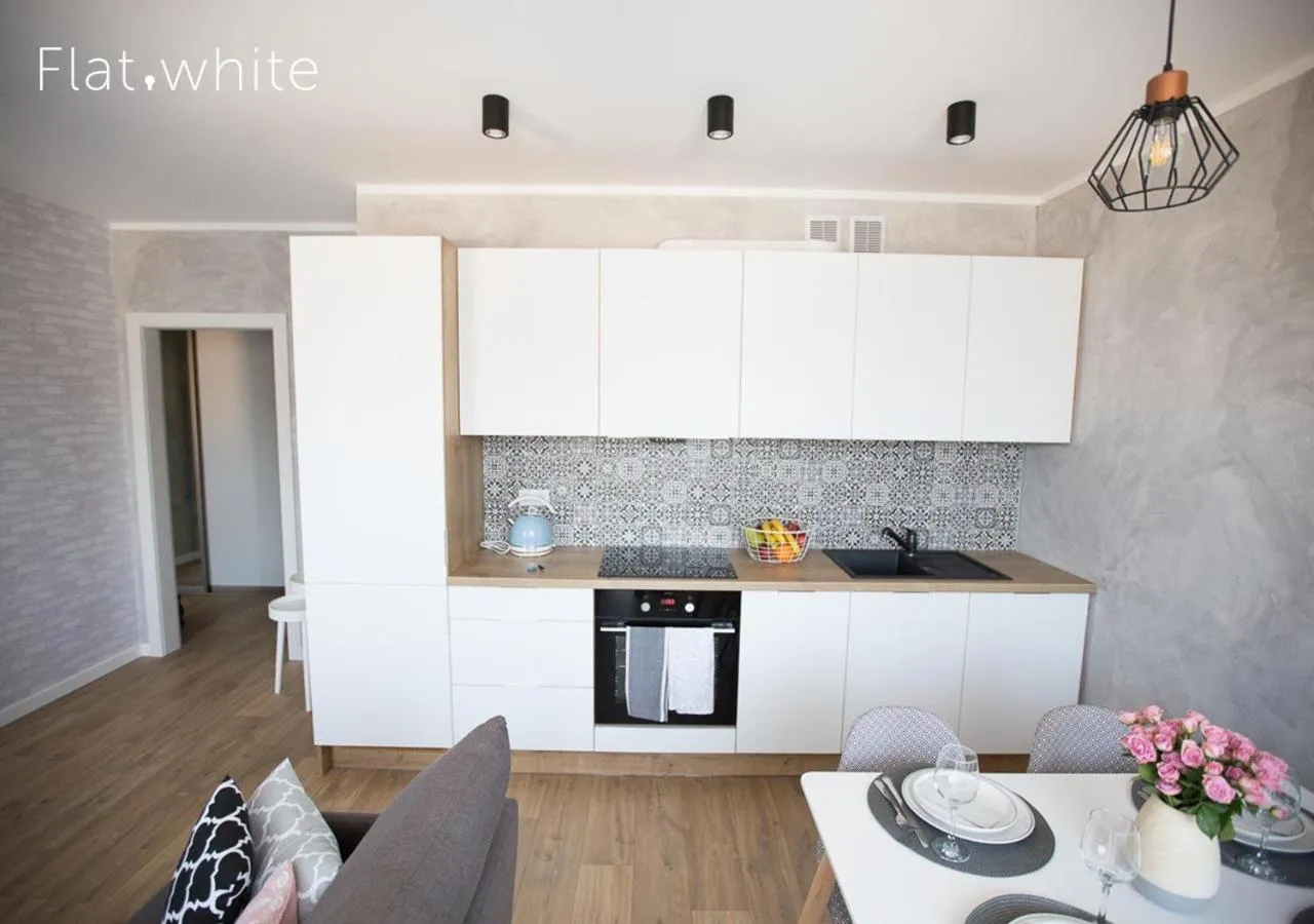 Kitchen or kitchenette in Apartamenty Flat White Zamkowa 4-6